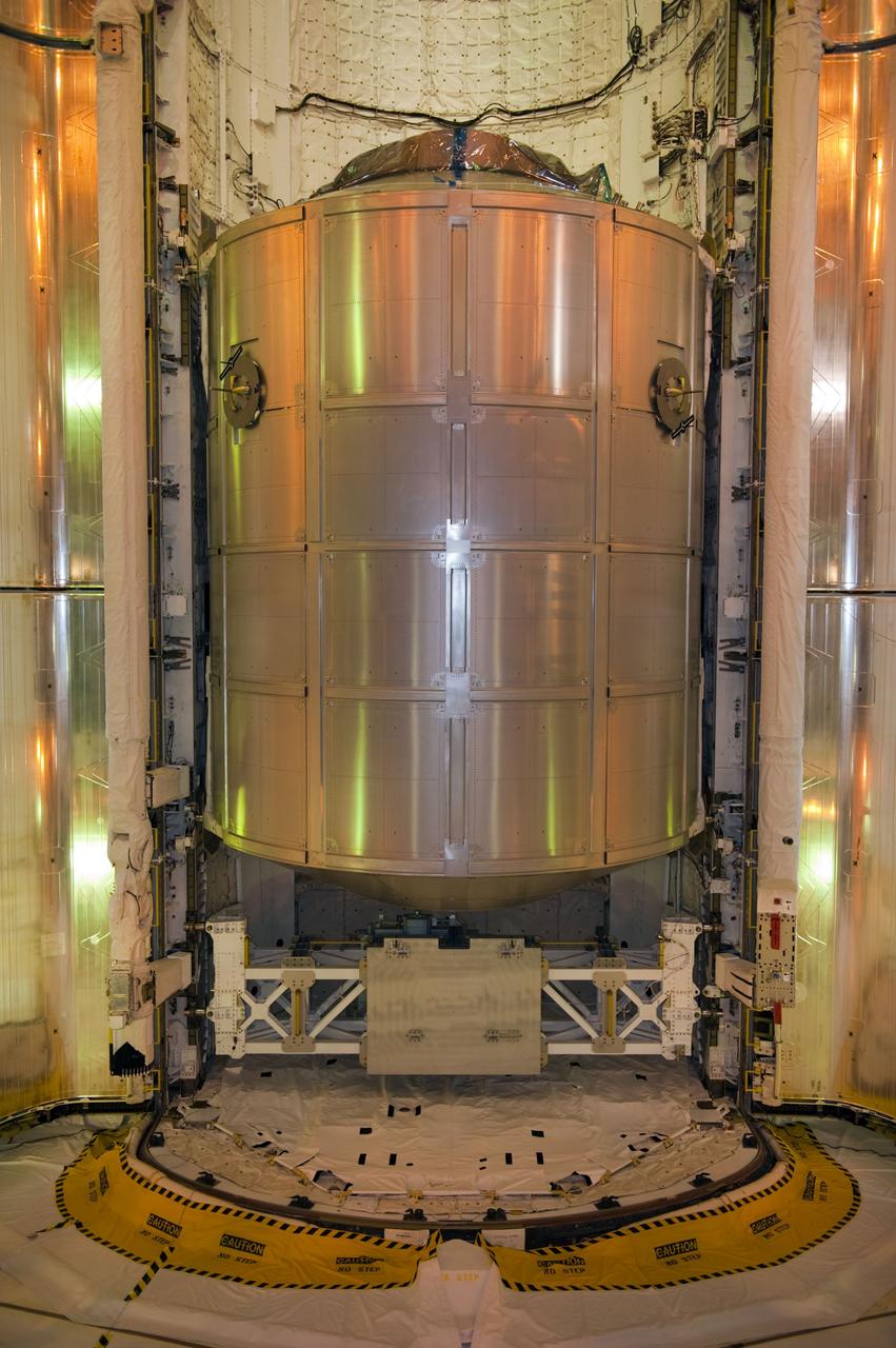CAPE CANAVERAL, Fla. -- At NASA's Kennedy Space Center in Florida, space shuttle Atlantis' cargo, the Raffaello multi-purpose logistics module (MPLM) now is installed into the shuttle's payload bay at Launch Pad 39A. The rotating service structure that protects the shuttle from the elements and provides access has been moved back into place.  STS-135 Commander Chris Ferguson, Pilot Doug Hurley and Mission Specialists Sandy Magnus and Rex Walheim are targeted to lift off on Atlantis July 8, taking with them the MPLM packed with supplies, logistics and spare parts to the station. The STS-135 mission also will fly a system to investigate the potential for robotically refueling existing satellites and return a failed ammonia pump module to help NASA better understand the failure mechanism and improve pump designs for future systems. STS-135 will be the 33rd flight of Atlantis, the 37th shuttle mission to the space station, and the 135th and final mission of NASA's Space Shuttle Program. For more information visit, www.nasa.gov/mission_pages/shuttle/shuttlemissions/sts135/index.html. Photo credit: NASA/Kim Shiflett
