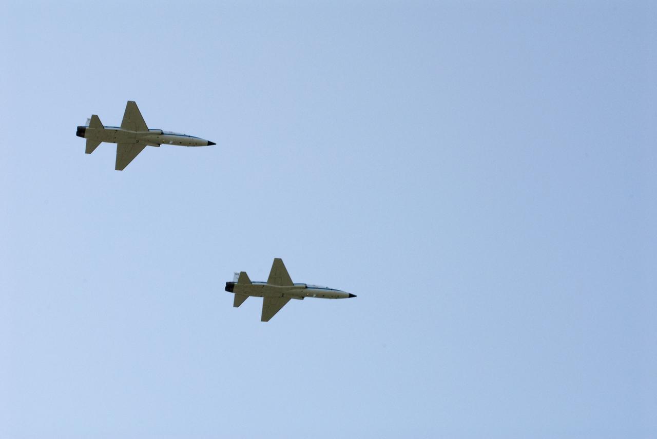 CAPE CANAVERAL, Fla. -- High above NASA's Kennedy Space Center in Florida, space shuttle Atlantis' crew members get ready to land their T-38 jets at the Shuttle Landing Facility. The astronauts are at Kennedy to participate in a launch countdown dress rehearsal called the Terminal Countdown Demonstration Test (TCDT) and related training in preparation for the upcoming STS-135 mission. Atlantis and its crew are targeted to lift off on July 8, taking with them the Raffaello multi-purpose logistics module packed with supplies, logistics and spare parts to the International Space Station. The STS-135 mission also will fly a system to investigate the potential for robotically refueling existing satellites and return a failed ammonia pump module to help NASA better understand the failure mechanism and improve pump designs for future systems. STS-135 will be the 33rd flight of Atlantis, the 37th shuttle mission to the station, and the 135th and final mission of NASA's Space Shuttle Program. For more information visit, www.nasa.gov/mission_pages/shuttle/shuttlemissions/sts135/index.html. Photo credit: NASA/Kim Shiflett