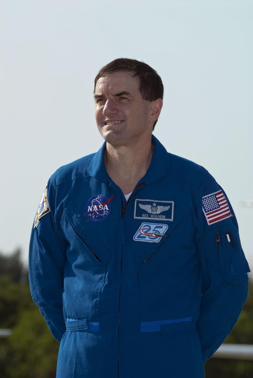 CAPE CANAVERAL, Fla. -- At the Shuttle Landing Facility at NASA's Kennedy Space Center in Florida, STS-135 Mission Specialist Rex Walheim pauses for a photo. The space shuttle Atlantis crew members arrived at Kennedy at about 5:30 p.m. EDT to participate in a launch countdown dress rehearsal called the Terminal Countdown Demonstration Test (TCDT) and related training in preparation for the upcoming STS-135 mission. Atlantis and its crew is targeted to lift off July 8, taking with them the Raffaello multi-purpose logistics module packed with supplies, logistics and spare parts to the International Space Station. The STS-135 mission also will fly a system to investigate the potential for robotically refueling existing satellites and return a failed ammonia pump module to help NASA better understand the failure mechanism and improve pump designs for future systems. STS-135 will be the 33rd flight of Atlantis, the 37th shuttle mission to the space station, and the 135th and final mission of NASA's Space Shuttle Program. For more information visit, www.nasa.gov/mission_pages/shuttle/shuttlemissions/sts135/index.html. Photo credit: NASA/Kim Shiflett