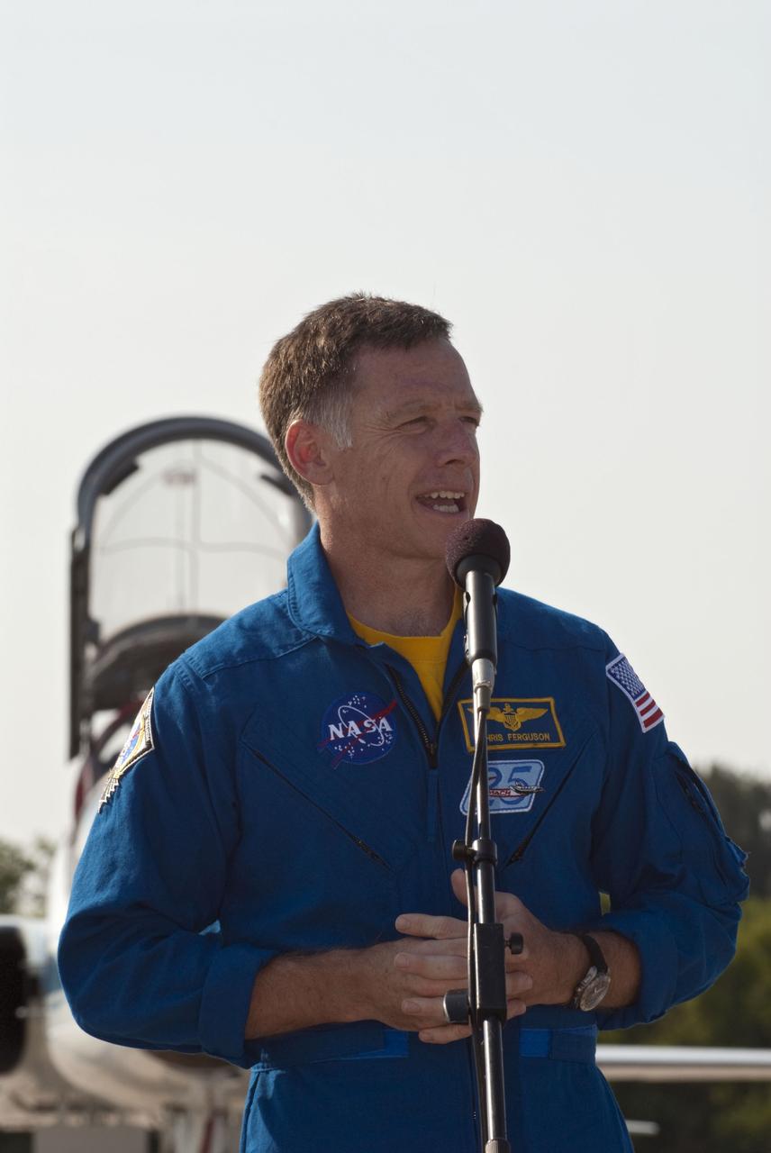 CAPE CANAVERAL, Fla. -- At the Shuttle Landing Facility at NASA's Kennedy Space Center in Florida, STS-135 Commander Chris Ferguson speaks to media. Space shuttle Atlantis' crew arrived at Kennedy at about 5:30 p.m. EDT to participate in a launch countdown dress rehearsal called the Terminal Countdown Demonstration Test (TCDT) and related training in preparation for the upcoming STS-135 mission.          The STS-135 crew is targeted to lift off July 8, taking with them the Raffaello multi-purpose logistics module packed with supplies, logistics and spare parts to the International Space Station. The STS-135 mission also will fly a system to investigate the potential for robotically refueling existing satellites and return a failed ammonia pump module to help NASA better understand the failure mechanism and improve pump designs for future systems. STS-135 will be the 33rd flight of Atlantis, the 37th shuttle mission to the space station, and the 135th and final mission of NASA's Space Shuttle Program. For more information visit, www.nasa.gov/mission_pages/shuttle/shuttlemissions/sts135/index.html. Photo credit: NASA/Kim Shiflett