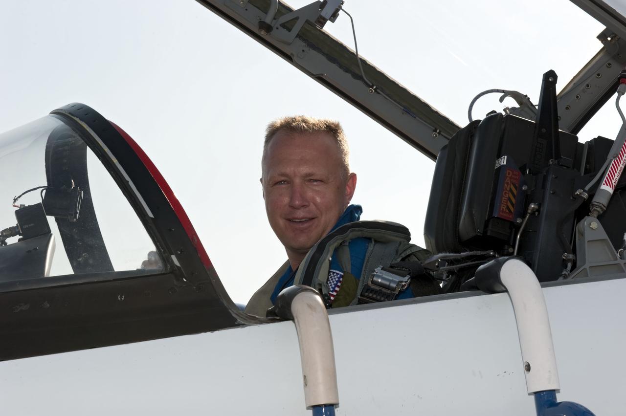 CAPE CANAVERAL, Fla. -- At the Shuttle Landing Facility at NASA's Kennedy Space Center in Florida, STS-135 Pilot Doug Hurley arrived aboard a T-38 jet. The STS-135 crew is at Kennedy to participate in a launch countdown dress rehearsal called the Terminal Countdown Demonstration Test (TCDT) and related training in preparation for the upcoming STS-135 mission. Ferguson, Pilot Doug Hurley and Mission Specialists Sandy Magnus and Rex Walheim are targeted to lift off July 8, taking with them the Raffaello multi-purpose logistics module packed with supplies and spare parts to the International Space Station. The STS-135 mission also will fly a system to investigate the potential for robotically refueling existing satellites and return a failed ammonia pump module to help NASA better understand the failure mechanism and improve pump designs for future systems. STS-135 will be the 33rd flight of Atlantis, the 37th shuttle mission to the space station, and the 135th and final mission of NASA's Space Shuttle Program. For more information visit, www.nasa.gov/mission_pages/shuttle/shuttlemissions/sts135/index.html. Photo credit: NASA/Kim Shiflett