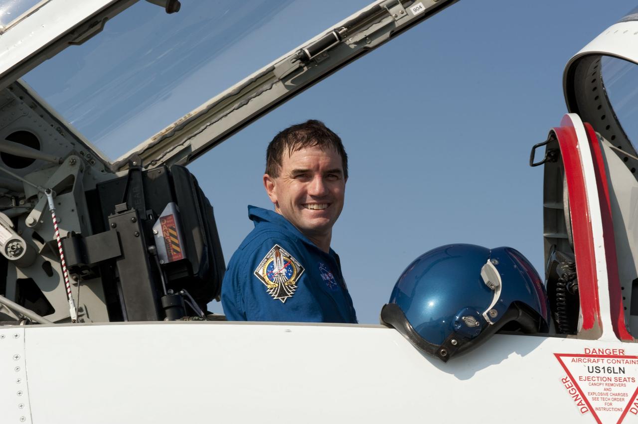 CAPE CANAVERAL, Fla. -- At the Shuttle Landing Facility at NASA's Kennedy Space Center in Florida, STS-135 Mission Specialist Rex Walheim arrives aboard a T-38 jet. The crew arrived at Kennedy at about 5:30 p.m. EDT to participate in a launch countdown dress rehearsal called the Terminal Countdown Demonstration Test (TCDT) and related training in preparation for the upcoming STS-135 mission. Commander Chris Ferguson, Pilot Doug Hurley and Mission Specialists Sandy Magnus and Rex Walheim are targeted to lift off July 8, taking with them the Raffaello multi-purpose logistics module packed with supplies and spare parts to the International Space Station. The STS-135 mission also will fly a system to investigate the potential for robotically refueling existing satellites and return a failed ammonia pump module to help NASA better understand the failure mechanism and improve pump designs for future systems. STS-135 will be the 33rd flight of Atlantis, the 37th shuttle mission to the space station, and the 135th and final mission of NASA's Space Shuttle Program. For more information visit, www.nasa.gov/mission_pages/shuttle/shuttlemissions/sts135/index.html. Photo credit: NASA/Kim Shiflett