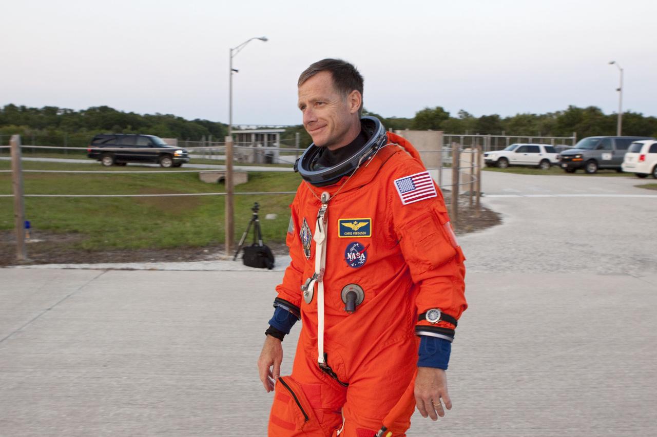CAPE CANAVERAL, Fla. -- STS-135 Commander Chris Ferguson prepares to perform touch-and-go landings aboard one of two Shuttle Training Aircrafts (STA) on the Shuttle Landing Facility runway at NASA's Kennedy Space Center in Florida. An STA is a Gulfstream II jet that is modified to mimic the shuttle's handling during the final phase of landing. Ferguson and Hurley will practice landings as part of standard training before space shuttle Atlantis' launch to the International Space Station. Atlantis and its crew are targeted to lift off July 8, to deliver the Raffaello multi-purpose logistics module packed with supplies and spare parts to the station. The STS-135 mission also will fly a system to investigate the potential for robotically refueling existing satellites and return a failed ammonia pump module to help NASA better understand the failure mechanism and improve pump designs for future systems. STS-135 will be the 33rd flight of Atlantis, the 37th shuttle mission to the space station, and the 135th and final mission of NASA's Space Shuttle Program. For more information visit, www.nasa.gov/mission_pages/shuttle/shuttlemissions/sts135/index.html. Photo credit: NASA/Troy Cryder