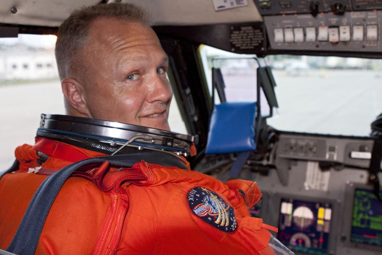 CAPE CANAVERAL, Fla. -- STS-135 Pilot Doug Hurley prepares to perform touch-and-go landings aboard one of two Shuttle Training Aircrafts (STA) on the Shuttle Landing Facility runway at NASA's Kennedy Space Center in Florida. An STA is a Gulfstream II jet that is modified to mimic the shuttle's handling during the final phase of landing. Ferguson and Hurley will practice landings as part of standard training before space shuttle Atlantis' launch to the International Space Station. Atlantis and its crew are targeted to lift off July 8, to deliver the Raffaello multi-purpose logistics module packed with supplies and spare parts to the station. The STS-135 mission also will fly a system to investigate the potential for robotically refueling existing satellites and return a failed ammonia pump module to help NASA better understand the failure mechanism and improve pump designs for future systems. STS-135 will be the 33rd flight of Atlantis, the 37th shuttle mission to the space station, and the 135th and final mission of NASA's Space Shuttle Program. For more information visit, www.nasa.gov/mission_pages/shuttle/shuttlemissions/sts135/index.html. Photo credit: NASA/Troy Cryder