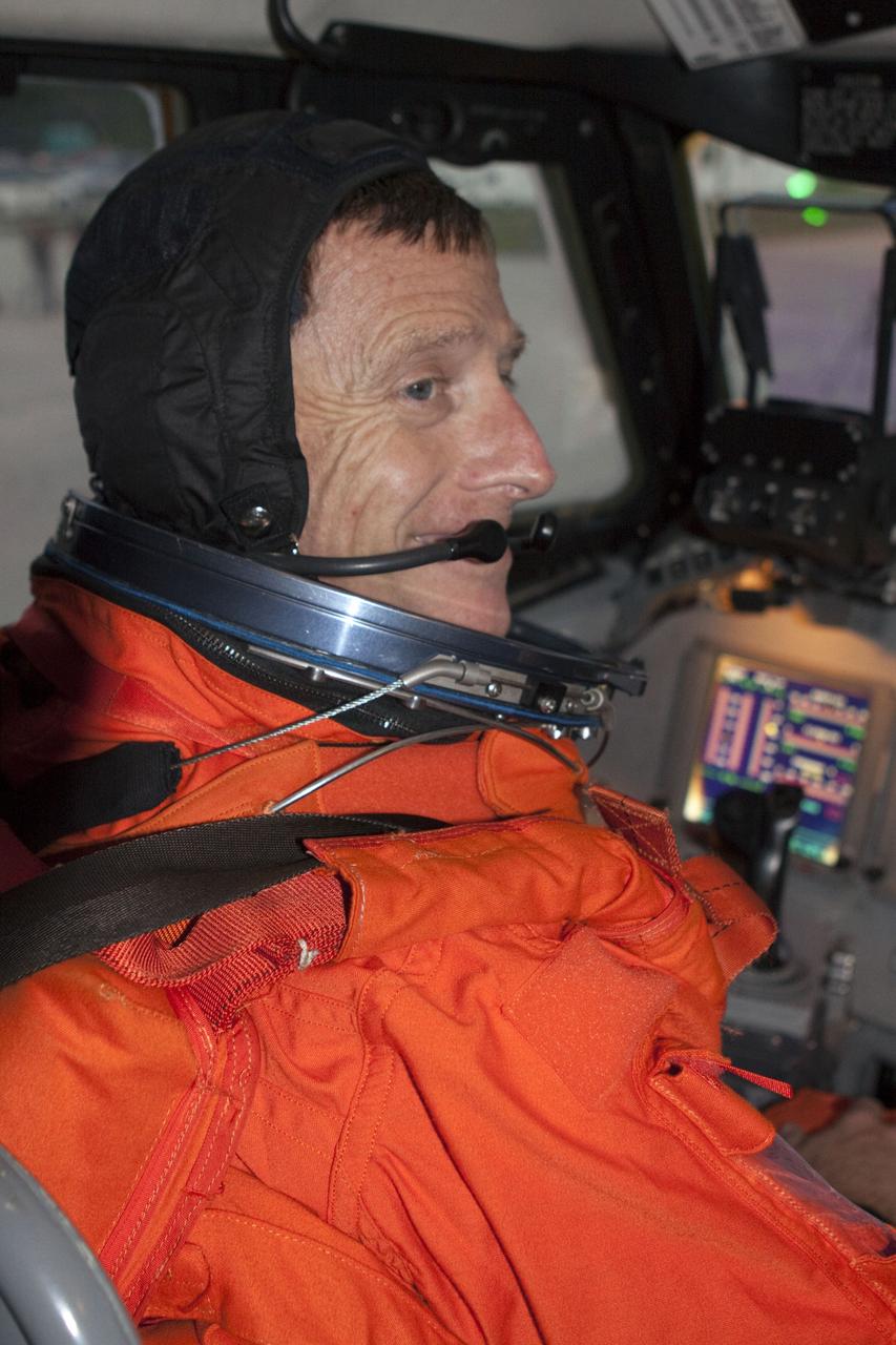 CAPE CANAVERAL, Fla. -- STS-135 Commander Chris Ferguson prepares to perform touch-and-go landings aboard one of two Shuttle Training Aircrafts (STA) on the Shuttle Landing Facility runway at NASA's Kennedy Space Center in Florida. An STA is a Gulfstream II jet that is modified to mimic the shuttle's handling during the final phase of landing. Ferguson and Hurley will practice landings as part of standard training before space shuttle Atlantis' launch to the International Space Station. Atlantis and its crew are targeted to lift off July 8, to deliver the Raffaello multi-purpose logistics module packed with supplies and spare parts to the station. The STS-135 mission also will fly a system to investigate the potential for robotically refueling existing satellites and return a failed ammonia pump module to help NASA better understand the failure mechanism and improve pump designs for future systems. STS-135 will be the 33rd flight of Atlantis, the 37th shuttle mission to the space station, and the 135th and final mission of NASA's Space Shuttle Program. For more information visit, www.nasa.gov/mission_pages/shuttle/shuttlemissions/sts135/index.html. Photo credit: NASA/Troy Cryder