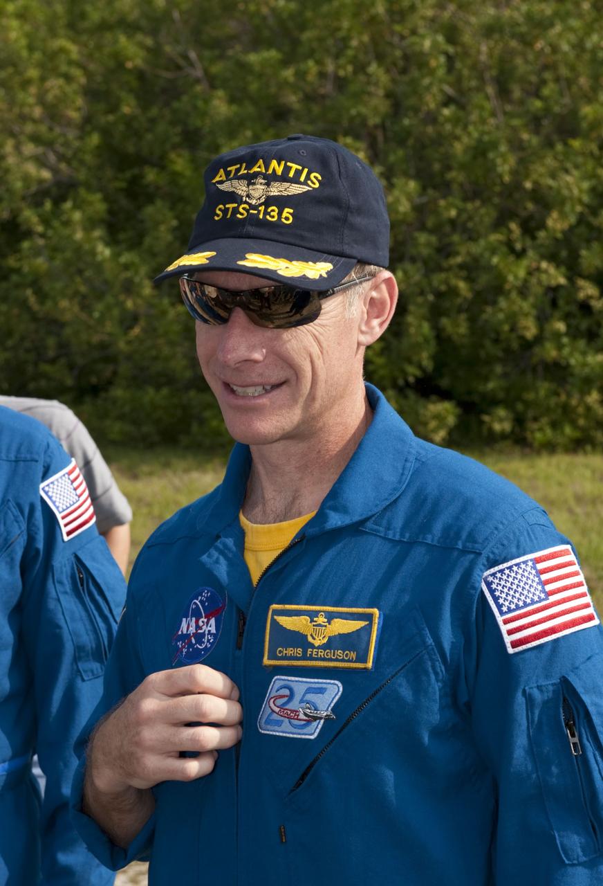 CAPE CANAVERAL, Fla. -- Commander Chris Ferguson pauses for a photo during M113 armored personnel carrier training at NASA's Kennedy Space Center in Florida. An M113 is kept at the foot of the launch pad in case an emergency exit from the launch pad is needed and every shuttle crew is trained on driving the vehicle before launch. The STS-135 crew is at Kennedy to participate in a launch countdown dress rehearsal called the Terminal Countdown Demonstration Test (TCDT) and related training. Atlantis and its crew are targeted to lift off July 8, taking with them the Raffaello multi-purpose logistics module packed with supplies and spare parts to the International Space Station. The STS-135 mission also will fly a system to investigate the potential for robotically refueling existing satellites and return a failed ammonia pump module to help NASA better understand the failure mechanism and improve pump designs for future systems. STS-135 will be the 33rd flight of Atlantis, the 37th shuttle mission to the space station, and the 135th and final mission of NASA's Space Shuttle Program. For more information visit, www.nasa.gov/mission_pages/shuttle/shuttlemissions/sts135/index.html. Photo credit: NASA/Kim Shiflett