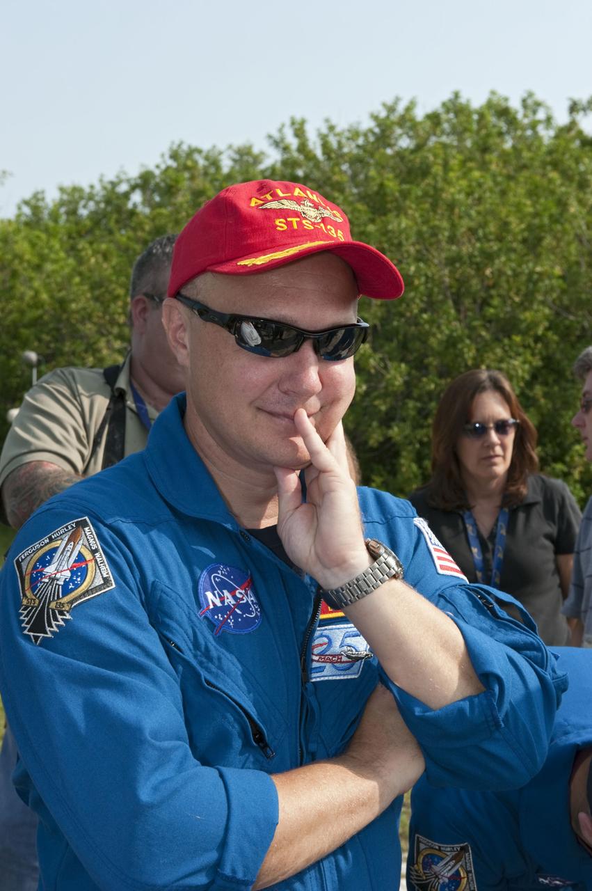 CAPE CANAVERAL, Fla. -- Pilot Doug Hurley pauses for a photo during M113 armored personnel carrier training at NASA's Kennedy Space Center in Florida. An M113 is kept at the foot of the launch pad in case an emergency exit from the launch pad is needed and every shuttle crew is trained on driving the vehicle before launch. The STS-135 crew is at Kennedy to participate in a launch countdown dress rehearsal called the Terminal Countdown Demonstration Test (TCDT) and related training. Atlantis and its crew are targeted to lift off July 8, taking with them the Raffaello multi-purpose logistics module packed with supplies and spare parts to the International Space Station. The STS-135 mission also will fly a system to investigate the potential for robotically refueling existing satellites and return a failed ammonia pump module to help NASA better understand the failure mechanism and improve pump designs for future systems. STS-135 will be the 33rd flight of Atlantis, the 37th shuttle mission to the space station, and the 135th and final mission of NASA's Space Shuttle Program. For more information visit, www.nasa.gov/mission_pages/shuttle/shuttlemissions/sts135/index.html. Photo credit: NASA/Kim Shiflett