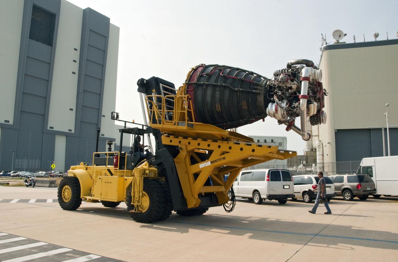 CAPE CANAVERAL, Fla. -- Engine No. 1, one of three space shuttle main engines, was removed from shuttle Endeavour and is being transported from Orbiter Processing Facility-1 to the Space Shuttle Main Engine Processing Facility at NASA's Kennedy Space Center in Florida.        The work is part of Endeavour's transition and retirement processing. The spacecraft is being prepared for public display at the California Science Center in Los Angeles. Endeavour flew 25 missions, spent 299 days in space, orbited Earth 4,671 times and traveled 122,883,151 miles over the course of its 19-year career. Endeavour's STS-134 and final mission was completed after landing on June 1, 2011. Photo credit: NASA/Chris Chamberland