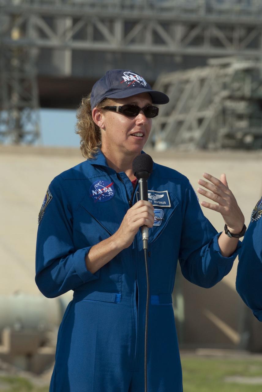 CAPE CANAVERAL, Fla. -- STS-135 Mission Specialist Sandy Magnus speaks to media during a question-and-answer session at NASA Kennedy Space Center's Launch Pad 39A in Florida. Space shuttle Atlantis' astronauts are at Kennedy to participate in a launch countdown dress rehearsal called the Terminal Countdown Demonstration Test (TCDT) and related training.            Atlantis and its crew are targeted to lift off July 8, taking with them the Raffaello multi-purpose logistics module packed with supplies and spare parts to the International Space Station. The STS-135 mission also will fly a system to investigate the potential for robotically refueling existing satellites and return a failed ammonia pump module to help NASA better understand the failure mechanism and improve pump designs for future systems. STS-135 will be the 33rd flight of Atlantis, the 37th shuttle mission to the space station, and the 135th and final mission of NASA's Space Shuttle Program. For more information visit, www.nasa.gov/mission_pages/shuttle/shuttlemissions/sts135/index.html. Photo credit: NASA/Kim Shiflett