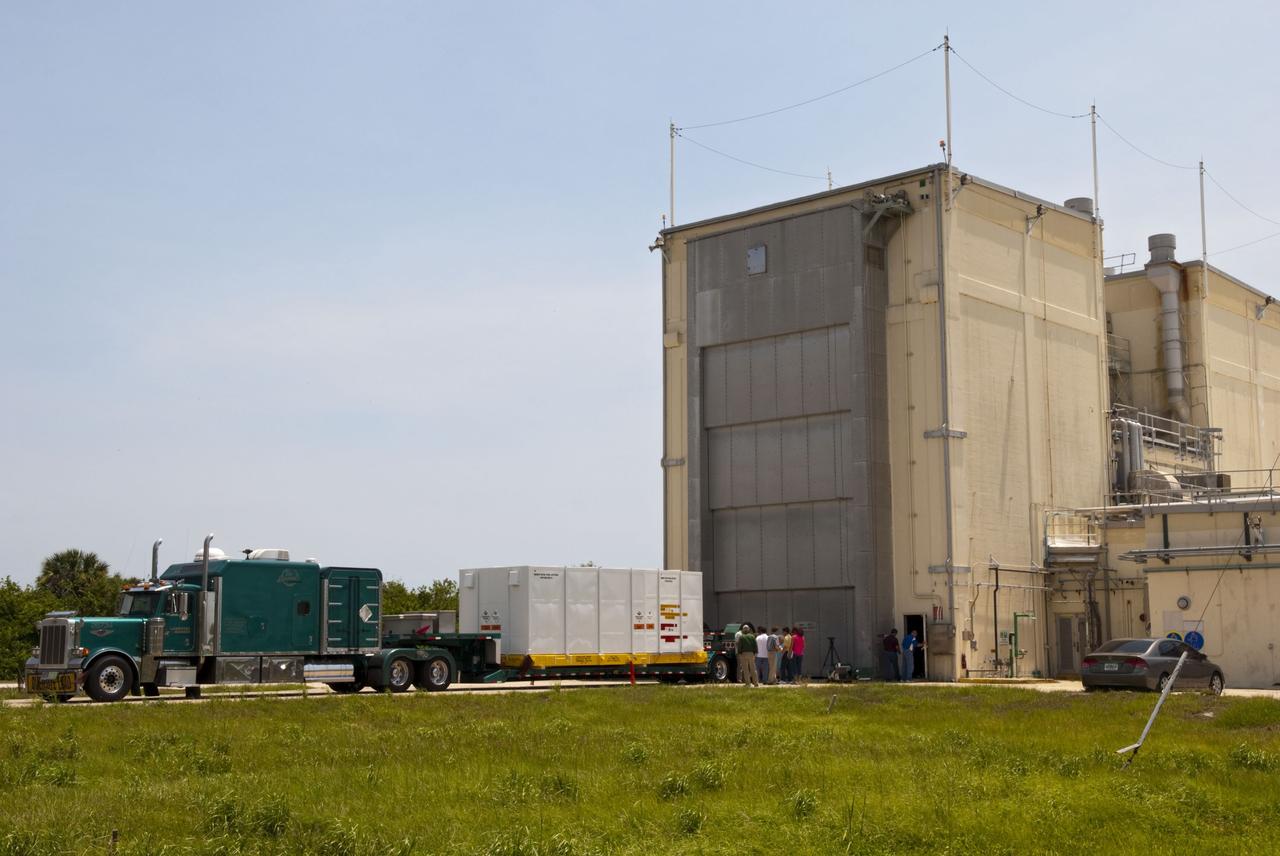 CAPE CANAVERAL, Fla. - Space shuttle Discovery's orbital maneuvering system pods and forward reaction control system have been loaded into a container and are being transported from NASA's Kennedy Space Center in Florida to White Sands Space Harbor in New Mexico. There, they will undergo a complete deservicing and cleaning. The removal is part of Discovery's transition and retirement processing. Shuttle Discovery will go to the Smithsonian's National Air and Space Museum, Steven F. Udvar-Hazy Center in Chantilly, Va., Endeavour will go to the California Science Center in Los Angeles and Enterprise will be moved from the Smithsonian to the Intrepid Sea, Air and Space Museum in New York. Shuttle Atlantis will go to the Kennedy Space Center Visitor Complex. Photo credit: NASA/Jim Grossmann