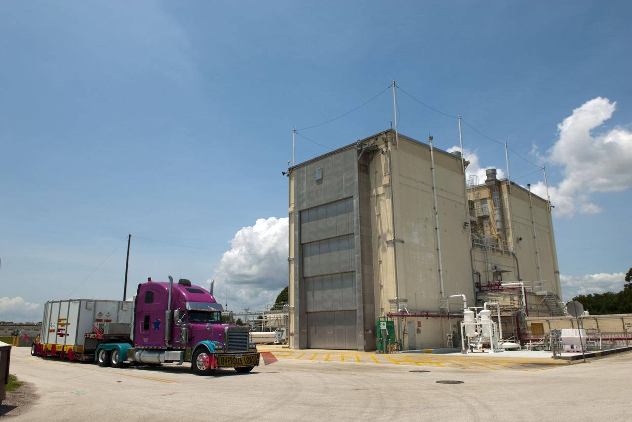 CAPE CANAVERAL, Fla. - Space shuttle Discovery's orbital maneuvering system pods and forward reaction control system have been loaded into a container and are being transported from NASA's Kennedy Space Center in Florida to White Sands Space Harbor in New Mexico. There, they will undergo a complete deservicing and cleaning. The removal is part of Discovery's transition and retirement processing. Shuttle Discovery will go to the Smithsonian's National Air and Space Museum, Steven F. Udvar-Hazy Center in Chantilly, Va., Endeavour will go to the California Science Center in Los Angeles and Enterprise will be moved from the Smithsonian to the Intrepid Sea, Air and Space Museum in New York. Shuttle Atlantis will go to the Kennedy Space Center Visitor Complex. Photo credit: NASA/Jim Grossmann