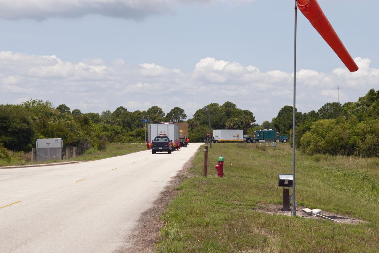 CAPE CANAVERAL, Fla. - Space shuttle Discovery's orbital maneuvering system pods and forward reaction control system have been loaded into a container and are being transported from NASA's Kennedy Space Center in Florida to White Sands Space Harbor in New Mexico. There, they will undergo a complete deservicing and cleaning. The removal is part of Discovery's transition and retirement processing. Shuttle Discovery will go to the Smithsonian's National Air and Space Museum, Steven F. Udvar-Hazy Center in Chantilly, Va., Endeavour will go to the California Science Center in Los Angeles and Enterprise will be moved from the Smithsonian to the Intrepid Sea, Air and Space Museum in New York. Shuttle Atlantis will go to the Kennedy Space Center Visitor Complex. Photo credit: NASA/Jim Grossmann