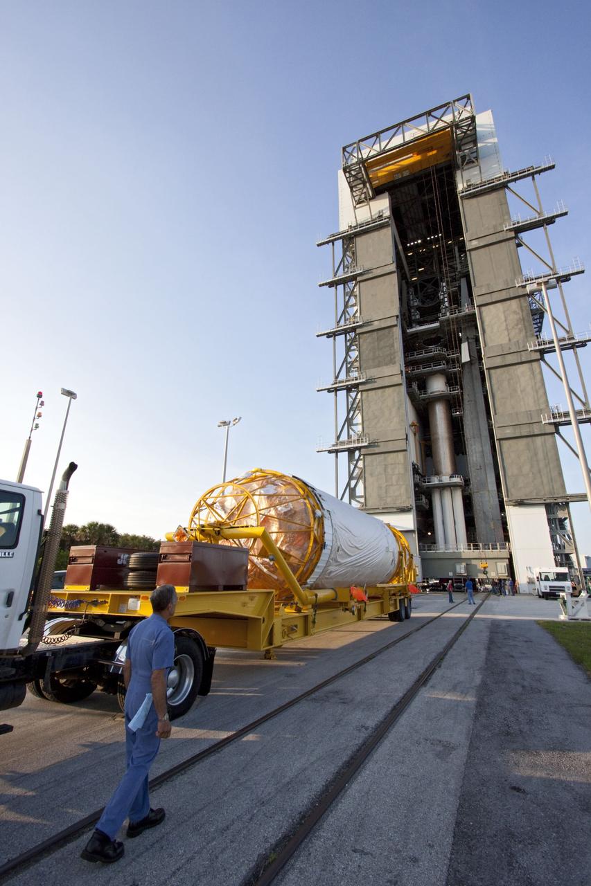 CAPE CANAVERAL, Fla. -- At Cape Canaveral Air Force Station in Florida, the Centaur upper stage for the United Launch Alliance Atlas V slated to launch NASA's Juno spacecraft, arrived at Launch Complex 41 after being transported from the Atlas Spaceflight Operations Center. It then will be lifted into the Vertical Integration Facility and attached to the Atlas V booster stage, already at the pad.        Juno is scheduled to launch aboard an Atlas V from Cape Canaveral, Fla. Aug. 5.The solar-powered spacecraft will orbit Jupiter's poles 33 times to find out more about the gas giant's origins, structure, atmosphere and magnetosphere and investigate the existence of a solid planetary core. For more information visit: www.nasa.gov/juno. Photo credit: NASA/Jim Grossmann