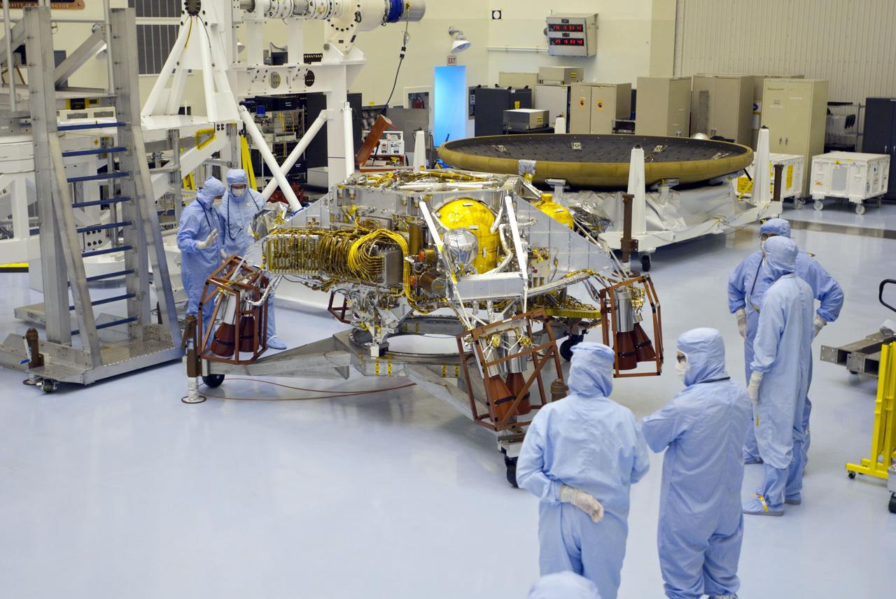 Cape Canaveral, Fla. -- At the Payload Hazardous Servicing Facility at NASA's Kennedy Space Center in Florida, technicians have removed the protective wrapping from the rocket-powered descent stage for NASA's Mars Science Laboratory (MSL). The descent stage will fly the MSL rover, Curiosity, during the final moments before landing on Mars. A United Launch Alliance Atlas V-541 configuration will be used to loft MSL into space. Curiosity’s 10 science instruments are designed to search for evidence on whether Mars has had environments favorable to microbial life, including chemical ingredients for life. The unique rover will use a laser to look inside rocks and release its gasses so that the rover’s spectrometer can analyze and send the data back to Earth. MSL is scheduled to launch from Cape Canaveral Air Force Station in Florida Nov. 25 with a window extending to Dec. 18 and arrival at Mars Aug. 2012. For more information, visit http://www.nasa.gov/msl. Photo credit: NASA/Charisse Nahser
