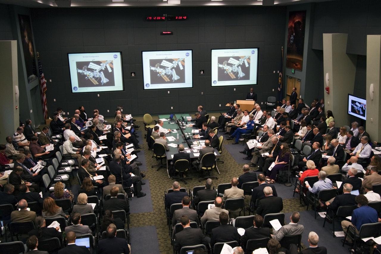 CAPE CANAVERAL, Fla. -- In the Operations Support Building II at NASA's Kennedy Space Center in Florida, Space Shuttle Program and mission managers meet for the traditional Flight Readiness Review, a thorough assessment of preparations for the mission. The June 28 meeting is designed to produce a number of key decisions about Atlantis' STS-135 mission, including the announcement of an official launch date. Atlantis and its crew are targeted to lift off July 8, taking with them the Raffaello multi-purpose logistics module packed with supplies and spare parts to the International Space Station. The STS-135 mission also will fly a system to investigate the potential for robotically refueling existing satellites and return a failed ammonia pump module to help NASA better understand the failure mechanism and improve pump designs for future systems. STS-135 will be the 33rd flight of Atlantis, the 37th shuttle mission to the space station, and the 135th and final mission of NASA's Space Shuttle Program. For more information visit, www.nasa.gov/mission_pages/shuttle/shuttlemissions/sts135/index.html. Photo credit: Jim Grossmann