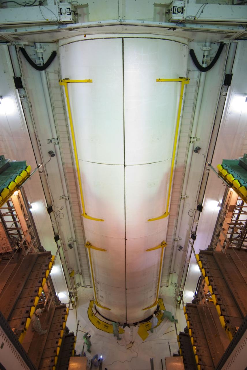 CAPE CANAVERAL, Fla. -- At Launch Pad 39A at NASA's Kennedy Space Center in Florida, space shuttle Atlantis' payload bay doors are closed around the STS-135 payload for flight. The payload arrived at the pad June 16 for installation into Atlantis and includes the Raffaello multi-purpose logistics module packed with supplies and spare parts for the International Space Station. The STS-135 mission also will fly a system to investigate the potential for robotically refueling existing satellites and return a failed ammonia pump module to help NASA better understand the failure mechanism and improve pump designs for future systems. Atlantis and its crew are scheduled to lift off at 11:26 a.m. EDT July 8. STS-135 will be the 33rd flight of Atlantis, the 37th shuttle mission to the space station, and the 135th and final mission of NASA's Space Shuttle Program. For more information, visit www.nasa.gov/shuttle. Photo credit: NASA/Jim Grossmann