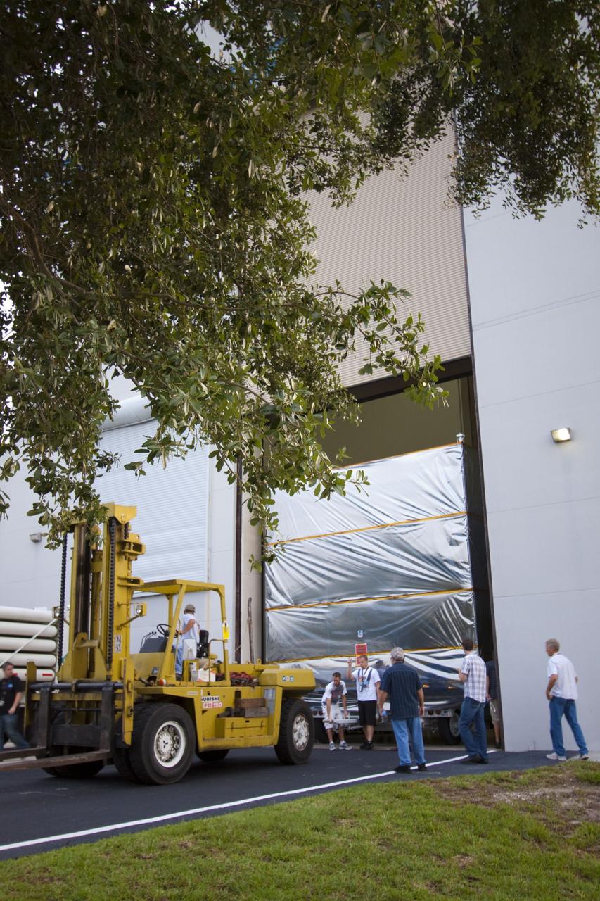 CAPE CANAVERAL, Fla. -- Workers prepare to transport NASA's Juno spacecraft from Astrotech's Payload Processing Facility in Titusville, Fla., to the Hazardous Processing Facility for fueling. The spacecraft will be loaded with the propellant necessary for orbit maneuvers and the attitude control system.          Juno is scheduled to launch aboard a United Launch Alliance Atlas V rocket from Cape Canaveral, Fla.,  Aug. 5.The solar-powered spacecraft will orbit Jupiter's poles 33 times to find out more about the gas giant's origins, structure, atmosphere and magnetosphere and investigate the existence of a solid planetary core. For more information visit: www.nasa.gov/juno. Photo credit: NASA/Troy Cryder