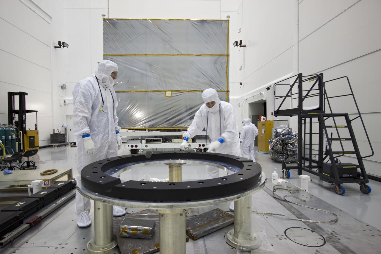 CAPE CANAVERAL, Fla. --  At Astrotech's Hazardous Processing Facility in Titusville, Fla.,  technicians prepare the fueling stand for NASA's Juno spacecraft where the spacecraft will be loaded with the propellant necessary for orbit maneuvers and the attitude control system.    Juno is scheduled to launch aboard a United Launch Alliance Atlas V rocket from Cape Canaveral, Fla.,  Aug. 5.The solar-powered spacecraft will orbit Jupiter's poles 33 times to find out more about the gas giant's origins, structure, atmosphere and magnetosphere and investigate the existence of a solid planetary core. For more information visit: www.nasa.gov/juno. Photo credit: NASA/Troy Cryder