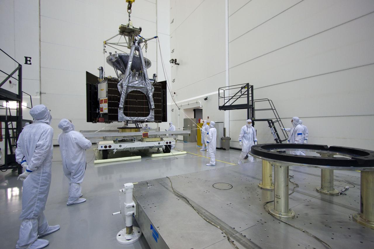 CAPE CANAVERAL, Fla. --  At Astrotech's Hazardous Processing Facility in Titusville, Fla.,  technicians using an overhead crane move NASA's Juno spacecraft to a fueling stand where the spacecraft will be loaded with the propellant necessary for orbit maneuvers and the attitude control system.          Juno is scheduled to launch aboard a United Launch Alliance Atlas V rocket from Cape Canaveral, Fla.,  Aug. 5.The solar-powered spacecraft will orbit Jupiter's poles 33 times to find out more about the gas giant's origins, structure, atmosphere and magnetosphere and investigate the existence of a solid planetary core. For more information visit: www.nasa.gov/juno. Photo credit: NASA/Troy Cryder