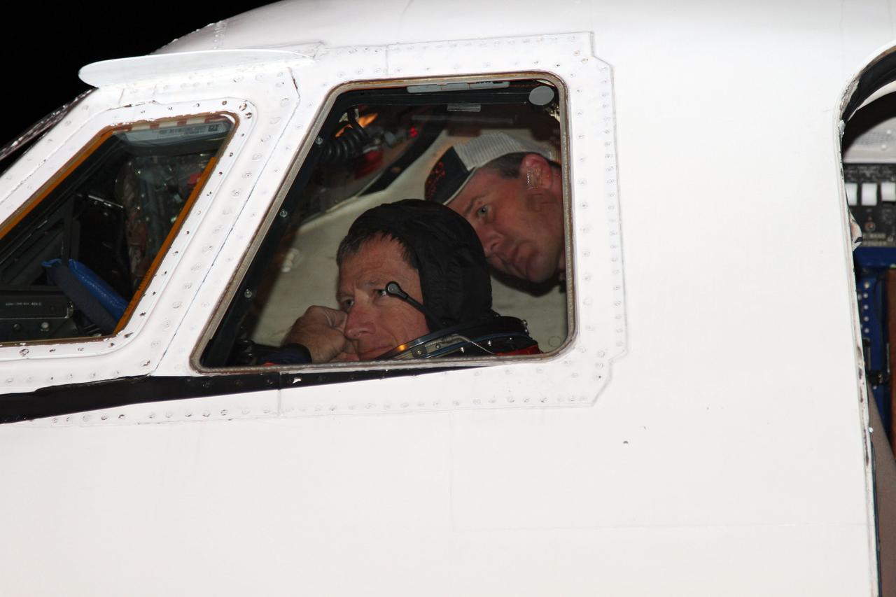 CAPE CANAVERAL, Fla. -- STS-135 Commander Chris Ferguson prepares to practice touch-and-go landings in a Shuttle Training Aircraft (STA) at the Shuttle Landing Facility at NASA's Kennedy Space Center in Florida. An STA is a Gulfstream II jet that is modified to mimic the shuttle's handling during the final phase of landing. Ferguson and Hurley will practice landings as part of standard procedure before space shuttle Atlantis' launch to the International Space Station. Atlantis and its crew are scheduled to lift off at 11:26 a.m. EDT on July 8 to deliver the Raffaello multi-purpose logistics module packed with supplies and spare parts to the station. The STS-135 mission also will fly a system to investigate the potential for robotically refueling existing satellites and return a failed ammonia pump module to help NASA better understand the failure mechanism and improve pump designs for future systems. STS-135 will be the 33rd flight of Atlantis, the 37th shuttle mission to the space station, and the 135th and final mission of NASA's Space Shuttle Program. For more information visit, www.nasa.gov/mission_pages/shuttle/shuttlemissions/sts135/index.html. Photo credit: NASA/Cory Huston