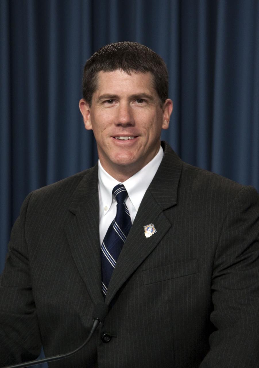 CAPE CANAVERAL, Fla. -- In the Press Site auditorium at NASA's Kennedy Space Center in Florida, NASA managers brief media about the payload and launch status of space shuttle Atlantis' STS-135 mission to the International Space Station. Seen here is NASA Test Director Jeremy Graeber. Atlantis and its crew are scheduled to lift off at 11:26 a.m. EDT on July 8 to deliver the Raffaello multi-purpose logistics module packed with supplies and spare parts to the station. The STS-135 mission also will fly a system to investigate the potential for robotically refueling existing satellites and return a failed ammonia pump module to help NASA better understand the failure mechanism and improve pump designs for future systems. STS-135 will be the 33rd flight of Atlantis, the 37th shuttle mission to the space station, and the 135th and final mission of NASA's Space Shuttle Program. For more information visit, www.nasa.gov/mission_pages/shuttle/shuttlemissions/sts135/index.html. Photo credit: NASA/Jim Grossmann