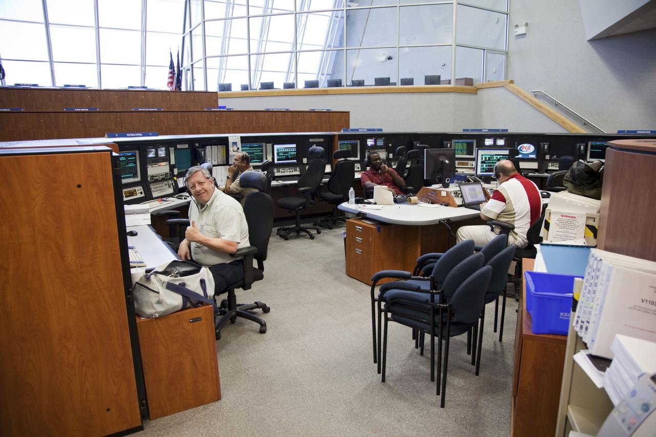 CAPE CANAVERAL, Fla. -- In Firing Room 4 in the Launch Control Center at NASA's Kennedy Space Center in Florida, launch team members took their posts at about 12:30 p.m. EDT, July 5 to prepare for space shuttle Atlantis' STS-135 mission to the International Space Station. The countdown clock began ticking backward from the T-43 hour mark at 1 p.m. Atlantis and its crew of four are scheduled to lift off at 11:26 a.m. EDT on July 8 to deliver the Raffaello multi-purpose logistics module packed with supplies and spare parts to the station. The STS-135 mission also will fly a system to investigate the potential for robotically refueling existing satellites and return a failed ammonia pump module to help NASA better understand the failure mechanism and improve pump designs for future systems. STS-135 will be the 33rd flight of Atlantis, the 37th shuttle mission to the space station, and the 135th and final mission of NASA's Space Shuttle Program. For more information visit, www.nasa.gov/mission_pages/shuttle/shuttlemissions/sts135/index.html. Photo credit: NASA/Frankie Martin