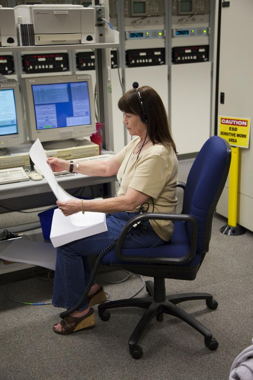 CAPE CANAVERAL, Fla. -- In Firing Room 4 in the Launch Control Center at NASA's Kennedy Space Center in Florida, launch team members sit at their consoles preparing for space shuttle Atlantis' STS-135 mission to the International Space Station. Atlantis and its crew of four are scheduled to lift off at 11:26 a.m. EDT on July 8 to deliver the Raffaello multi-purpose logistics module packed with supplies and spare parts to the station. The STS-135 mission also will fly a system to investigate the potential for robotically refueling existing satellites and return a failed ammonia pump module to help NASA better understand the failure mechanism and improve pump designs for future systems. STS-135 will be the 33rd flight of Atlantis, the 37th shuttle mission to the space station, and the 135th and final mission of NASA's Space Shuttle Program. For more information visit, www.nasa.gov/mission_pages/shuttle/shuttlemissions/sts135/index.html. Photo credit: NASA/Frankie Martin