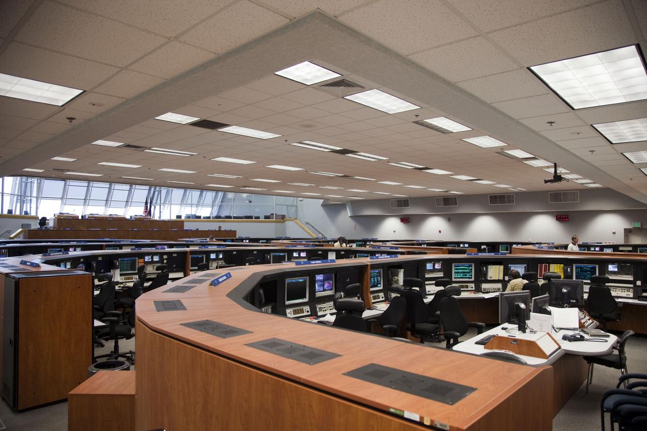 CAPE CANAVERAL, Fla. -- In Firing Room 4 in the Launch Control Center at NASA's Kennedy Space Center in Florida, launch team members sit at their consoles preparing for space shuttle Atlantis' STS-135 mission to the International Space Station. Atlantis and its crew of four are scheduled to lift off at 11:26 a.m. EDT on July 8 to deliver the Raffaello multi-purpose logistics module packed with supplies and spare parts to the station. The STS-135 mission also will fly a system to investigate the potential for robotically refueling existing satellites and return a failed ammonia pump module to help NASA better understand the failure mechanism and improve pump designs for future systems. STS-135 will be the 33rd flight of Atlantis, the 37th shuttle mission to the space station, and the 135th and final mission of NASA's Space Shuttle Program. For more information visit, www.nasa.gov/mission_pages/shuttle/shuttlemissions/sts135/index.html. Photo credit: NASA/Frankie Martin