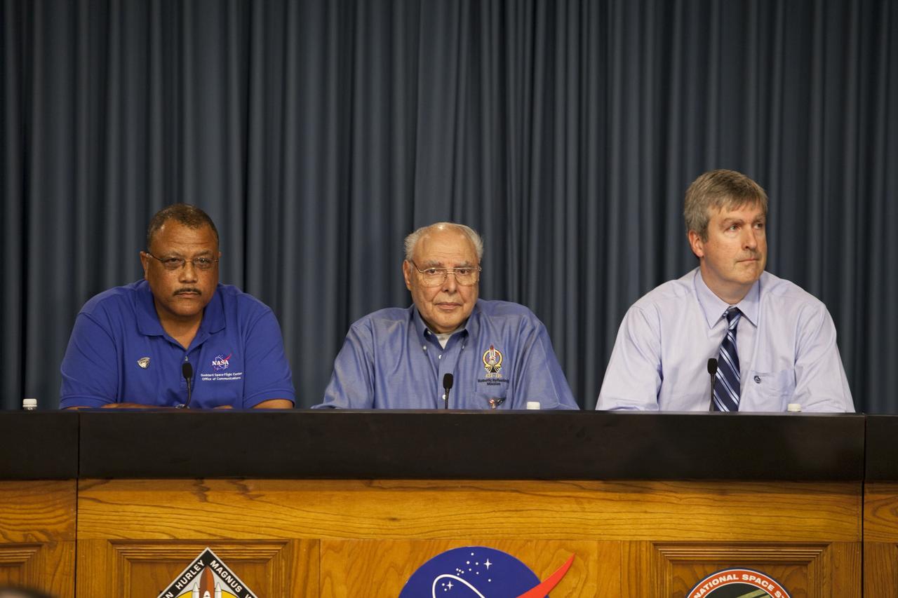 CAPE CANAVERAL, Fla. -- The Press Site auditorium at NASA's Kennedy Space Center in Florida hosted a Robotic Refueling Mission (RRM) module demonstration. Seen here speaking with media are Dewayne Washington from NASA's Goddard Space Flight Center in Maryland, moderator (left); Frank Cepollina, project manager with NASA's Satellite Servicing Capabilities Office and Mathieu Caron, Mission Operations manager with the Canadian Space Agency. Space shuttle Atlantis will fly the RRM on its STS-135 mission to the International Space Station. Once in place the RRM will use the station's two-armed robotic system, known as Dextre, to investigate the potential for robotically refueling existing satellites in orbit. Atlantis and its crew of four are scheduled to lift off at 11:26 a.m. EDT on July 8 to deliver the Raffaello multi-purpose logistics module packed with supplies and spare parts to the station. Atlantis also will fly the RRM and return a failed ammonia pump module to help NASA better understand the failure mechanism and improve pump designs for future systems. STS-135 will be the 33rd flight of Atlantis, the 37th shuttle mission to the space station, and the 135th and final mission of NASA's Space Shuttle Program. For more information visit, www.nasa.gov/mission_pages/shuttle/shuttlemissions/sts135/index.html. Photo credit: NASA/Frankie Martin