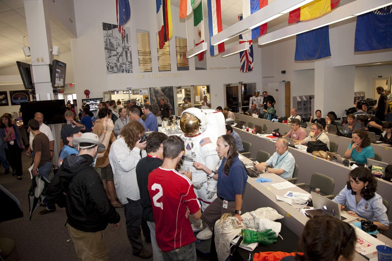 CAPE CANAVERAL, Fla. -- Media from around the globe gather at the Press Site bull pen at NASA's Kennedy Space Center in Florida to cover the prelaunch activities and lift off of space shuttle Atlantis on its STS-135 mission to the International Space Station. Atlantis and its crew of four; Commander Chris Ferguson, Pilot Doug Hurley and Mission Specialists Sandy Magnus and Rex Walheim, are scheduled to lift off at 11:26 a.m. EDT on July 8 to deliver the Raffaello multi-purpose logistics module packed with supplies and spare parts to the station. Atlantis also will fly the Robotic Refueling Mission experiment that will investigate the potential for robotically refueling existing satellites in orbit. In addition, Atlantis will return with a failed ammonia pump module to help NASA better understand the failure mechanism and improve pump designs for future systems. STS-135 will be the 33rd flight of Atlantis, the 37th shuttle mission to the space station, and the 135th and final mission of NASA's Space Shuttle Program. For more information visit, www.nasa.gov/mission_pages/shuttle/shuttlemissions/sts135/index.html. Photo credit: NASA/Frankie Martin