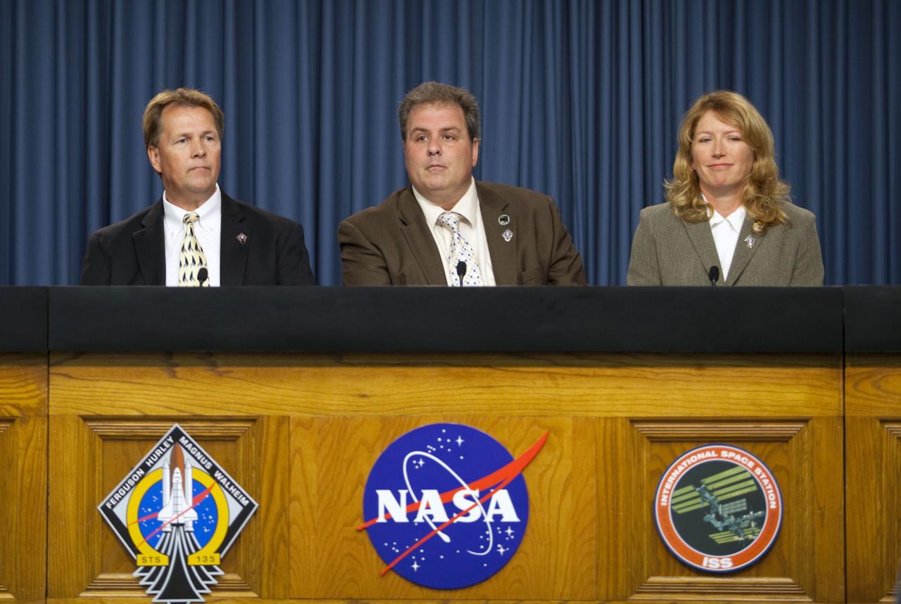 CAPE CANAVERAL, Fla. -- In the Press Site auditorium at NASA's Kennedy Space Center in Florida, NASA managers brief media about the payload and launch status of space shuttle Atlantis' STS-135 mission to the International Space Station. Seen here are NASA Test Director Jeff Spaulding (left), Payload Mission Manager Joe Delai and Shuttle Weather Officer Kathy Winters.        Atlantis and its crew of four; Commander Chris Ferguson, Pilot Doug Hurley and Mission Specialists Sandy Magnus and Rex Walheim, are scheduled to lift off at 11:26 a.m. EDT on July 8 to deliver the Raffaello multi-purpose logistics module packed with supplies and spare parts to the station. Atlantis also will fly the Robotic Refueling Mission experiment that will investigate the potential for robotically refueling existing satellites in orbit. In addition, Atlantis will return with a failed ammonia pump module to help NASA better understand the failure mechanism and improve pump designs for future systems. STS-135 will be the 33rd flight of Atlantis, the 37th shuttle mission to the space station, and the 135th and final mission of NASA's Space Shuttle Program. For more information visit, www.nasa.gov/mission_pages/shuttle/shuttlemissions/sts135/index.html. Photo credit: NASA/Frankie Martin