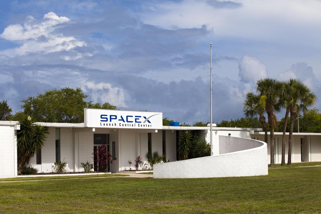 CAPE CANAVERAL, Fla. -- Space Exploration Technologies Corp., or SpaceX, opens its doors for a media tour of its Launch Control Center at Cape Canaveral Air Force Station, or CCAFS, in Florida. In December 2010, SpaceX launched its Falcon 9 rocket and Dragon spacecraft from CCAFS's Launch Complex 40. The Dragon capsule went through several maneuvers before it re-entered the atmosphere and splashed down in the Pacific Ocean about 500 miles west of the coast of Mexico. That was the first demonstration flight for NASA's Commercial Orbital Transportation Services (COTS) program, which will provide cargo flights to the International Space Station in the future. The company is preparing for another launch in late 2011, in which the Dragon spacecraft and trunk will fly close to the space station so the station’s robotic arm can grab the spacecraft and bring it in for a docking. Photo credit: NASA/Frankie Martin