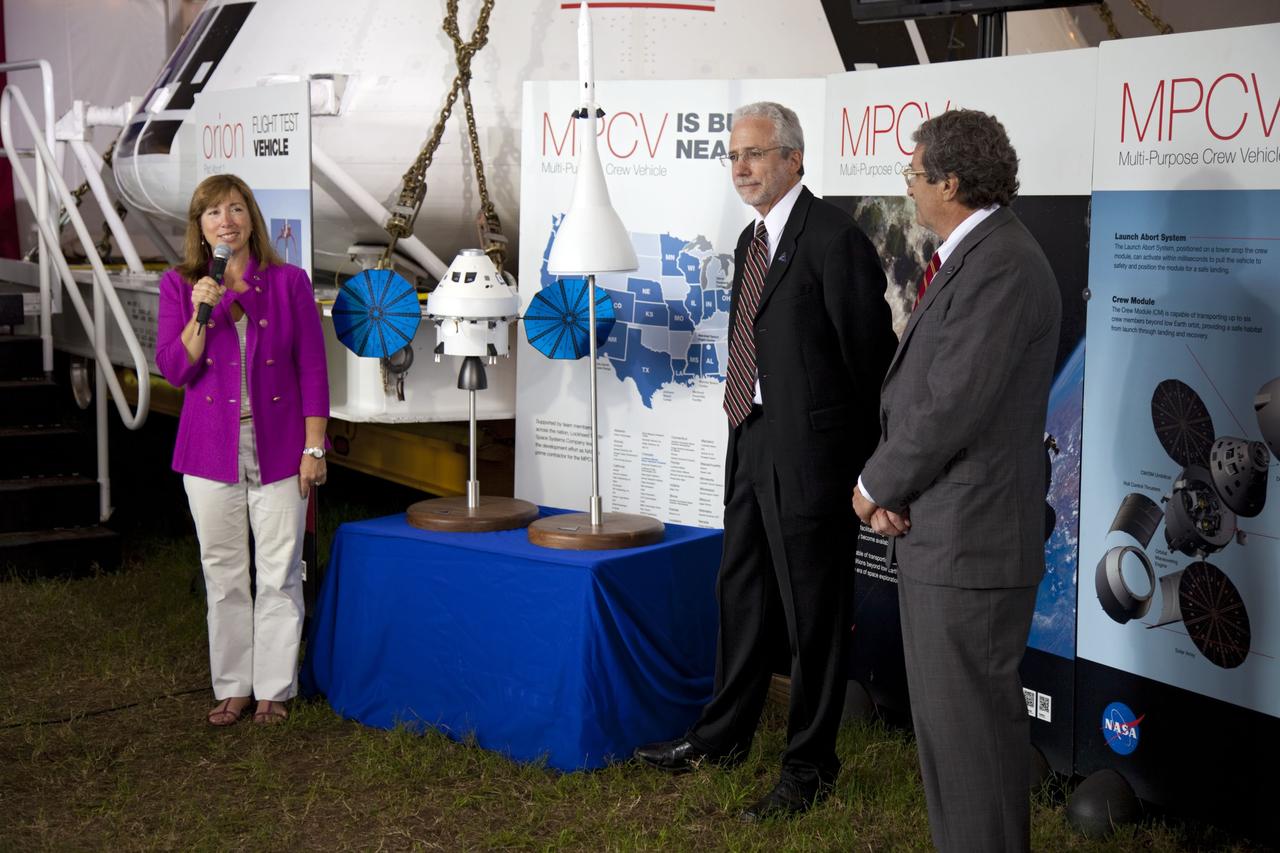 CAPE CANAVERAL, Fla. -- A media event was held on the grounds near the Press Site at NASA's Kennedy Space Center in Florida where a Multi-Purpose Crew Vehicle (MPCV) is on display. The MPCV is based on the Orion design requirements for traveling beyond low Earth orbit and will serve as the exploration vehicle that will carry the crew to space, provide emergency abort capability, sustain the crew during the space travel, and provide safe re-entry from deep space return velocities. Seen here is Lori Garver, NASA deputy administrator, Mark Geyer, Multi-Purpose Crew Vehicle program manager and Laurence A. Price, Orion deputy program manager with Lockheed Martin Space Systems Company to talk about the vehicle during a question-and-answer session. Photo credit: NASA/Frankie Martin