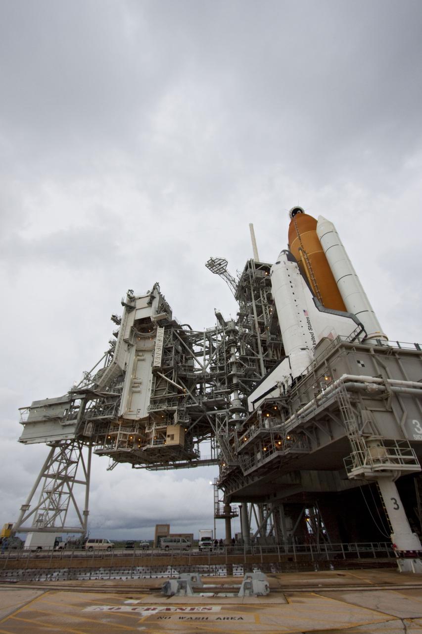 CAPE CANAVERAL, Fla. -- Space shuttle Atlantis is revealed on Launch Pad 39A at NASA's Kennedy Space Center in Florida following the move of the rotating service structure (RSS). The structure provides weather protection and access to the shuttle while it awaits liftoff on the pad. RSS "rollback" marks a major milestone in Atlantis' STS-135 mission countdown.      Atlantis and its crew of four; Commander Chris Ferguson, Pilot Doug Hurley and Mission Specialists Sandy Magnus and Rex Walheim, are scheduled to lift off at 11:26 a.m. EDT on July 8 to deliver the Raffaello multi-purpose logistics module packed with supplies and spare parts to the International Space Station. Atlantis also will fly the Robotic Refueling Mission experiment that will investigate the potential for robotically refueling existing satellites in orbit. In addition, Atlantis will return with a failed ammonia pump module to help NASA better understand the failure mechanism and improve pump designs for future systems. STS-135 will be the 33rd flight of Atlantis, the 37th shuttle mission to the space station, and the 135th and final mission of NASA's Space Shuttle Program. For more information visit, www.nasa.gov/mission_pages/shuttle/shuttlemissions/sts135/index.html. Photo credit: NASA/Troy Cryder