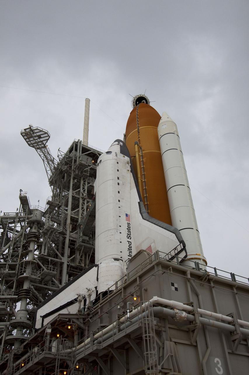 CAPE CANAVERAL, Fla. -- Space shuttle Atlantis is revealed on Launch Pad 39A at NASA's Kennedy Space Center in Florida following the move of the rotating service structure (RSS). The structure provides weather protection and access to the shuttle while it awaits liftoff on the pad. RSS "rollback" marks a major milestone in Atlantis' STS-135 mission countdown.      Atlantis and its crew of four; Commander Chris Ferguson, Pilot Doug Hurley and Mission Specialists Sandy Magnus and Rex Walheim, are scheduled to lift off at 11:26 a.m. EDT on July 8 to deliver the Raffaello multi-purpose logistics module packed with supplies and spare parts to the International Space Station. Atlantis also will fly the Robotic Refueling Mission experiment that will investigate the potential for robotically refueling existing satellites in orbit. In addition, Atlantis will return with a failed ammonia pump module to help NASA better understand the failure mechanism and improve pump designs for future systems. STS-135 will be the 33rd flight of Atlantis, the 37th shuttle mission to the space station, and the 135th and final mission of NASA's Space Shuttle Program. For more information visit, www.nasa.gov/mission_pages/shuttle/shuttlemissions/sts135/index.html. Photo credit: NASA/Troy Cryder