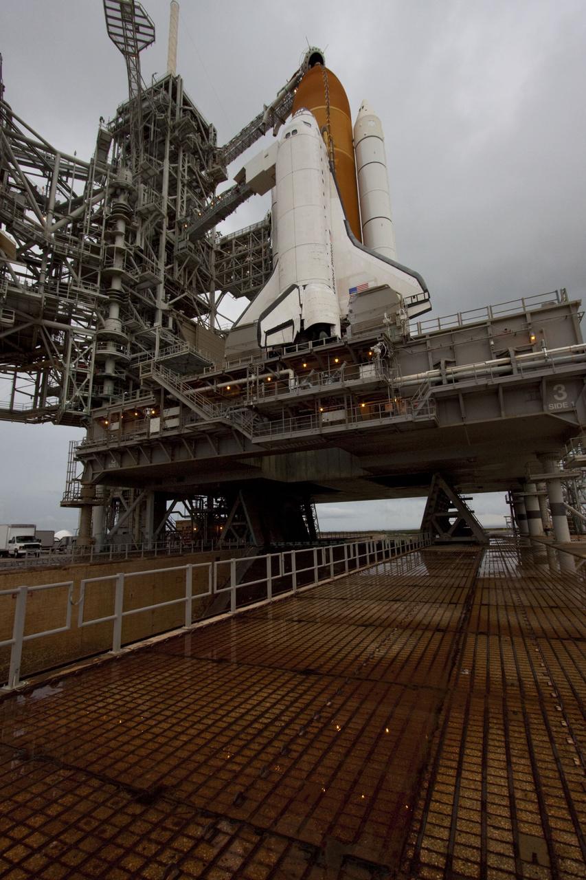 CAPE CANAVERAL, Fla. -- Space shuttle Atlantis is revealed on Launch Pad 39A at NASA's Kennedy Space Center in Florida following the move of the rotating service structure (RSS). The structure provides weather protection and access to the shuttle while it awaits liftoff on the pad. RSS "rollback" marks a major milestone in Atlantis' STS-135 mission countdown.            Atlantis and its crew of four; Commander Chris Ferguson, Pilot Doug Hurley and Mission Specialists Sandy Magnus and Rex Walheim, are scheduled to lift off at 11:26 a.m. EDT on July 8 to deliver the Raffaello multi-purpose logistics module packed with supplies and spare parts to the International Space Station. Atlantis also will fly the Robotic Refueling Mission experiment that will investigate the potential for robotically refueling existing satellites in orbit. In addition, Atlantis will return with a failed ammonia pump module to help NASA better understand the failure mechanism and improve pump designs for future systems. STS-135 will be the 33rd flight of Atlantis, the 37th shuttle mission to the space station, and the 135th and final mission of NASA's Space Shuttle Program. For more information visit, www.nasa.gov/mission_pages/shuttle/shuttlemissions/sts135/index.html. Photo credit: NASA/Troy Cryder