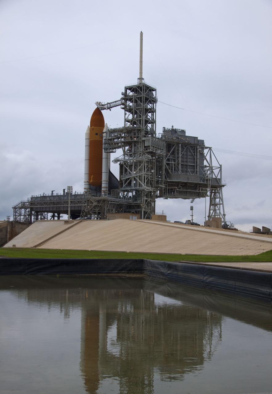 CAPE CANAVERAL, Fla. -- Space shuttle Atlantis is revealed on Launch Pad 39A at NASA's Kennedy Space Center in Florida following the move of the rotating service structure (RSS). The structure provides weather protection and access to the shuttle while it awaits liftoff on the pad. RSS "rollback" marks a major milestone in Atlantis' STS-135 mission countdown.            Atlantis and its crew of four; Commander Chris Ferguson, Pilot Doug Hurley and Mission Specialists Sandy Magnus and Rex Walheim, are scheduled to lift off at 11:26 a.m. EDT on July 8 to deliver the Raffaello multi-purpose logistics module packed with supplies and spare parts to the International Space Station. Atlantis also will fly the Robotic Refueling Mission experiment that will investigate the potential for robotically refueling existing satellites in orbit. In addition, Atlantis will return with a failed ammonia pump module to help NASA better understand the failure mechanism and improve pump designs for future systems. STS-135 will be the 33rd flight of Atlantis, the 37th shuttle mission to the space station, and the 135th and final mission of NASA's Space Shuttle Program. For more information visit, www.nasa.gov/mission_pages/shuttle/shuttlemissions/sts135/index.html. Photo credit: NASA/Troy Cryder