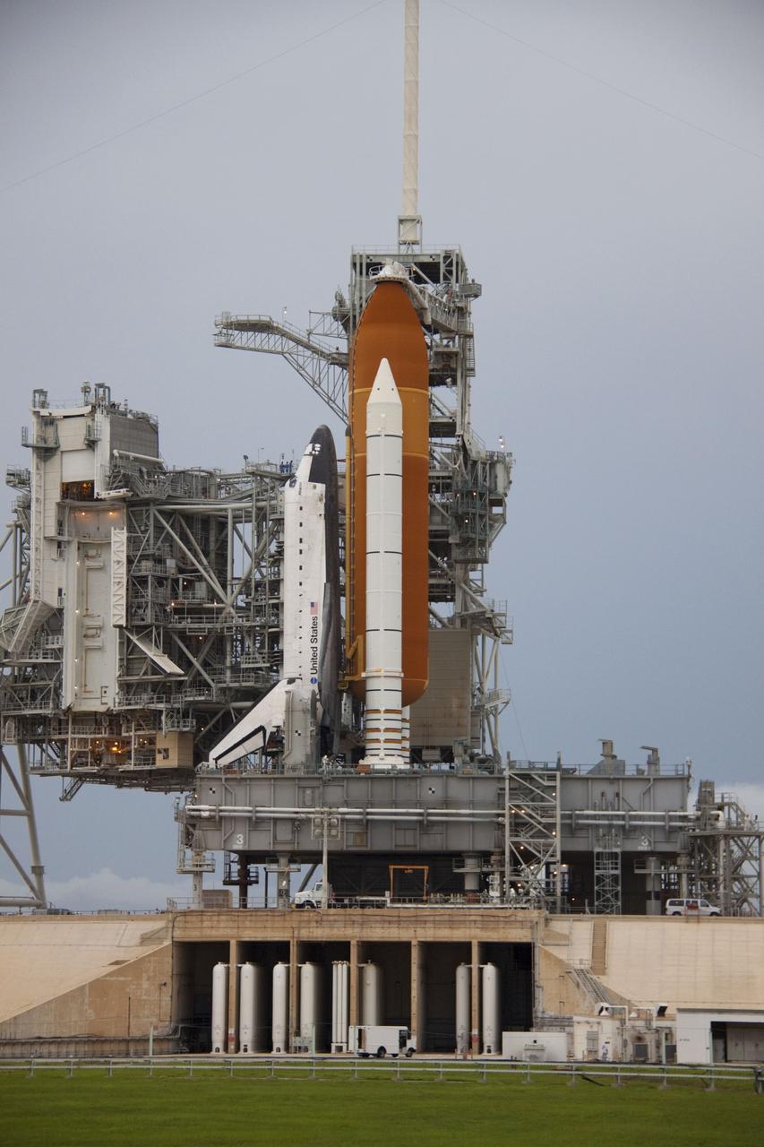 CAPE CANAVERAL, Fla. -- Space shuttle Atlantis is revealed on Launch Pad 39A at NASA's Kennedy Space Center in Florida following the move of the rotating service structure (RSS). The structure provides weather protection and access to the shuttle while it awaits liftoff on the pad. RSS "rollback" marks a major milestone in Atlantis' STS-135 mission countdown.            Atlantis and its crew of four; Commander Chris Ferguson, Pilot Doug Hurley and Mission Specialists Sandy Magnus and Rex Walheim, are scheduled to lift off at 11:26 a.m. EDT on July 8 to deliver the Raffaello multi-purpose logistics module packed with supplies and spare parts to the International Space Station. Atlantis also will fly the Robotic Refueling Mission experiment that will investigate the potential for robotically refueling existing satellites in orbit. In addition, Atlantis will return with a failed ammonia pump module to help NASA better understand the failure mechanism and improve pump designs for future systems. STS-135 will be the 33rd flight of Atlantis, the 37th shuttle mission to the space station, and the 135th and final mission of NASA's Space Shuttle Program. For more information visit, www.nasa.gov/mission_pages/shuttle/shuttlemissions/sts135/index.html. Photo credit: NASA/Troy Cryder