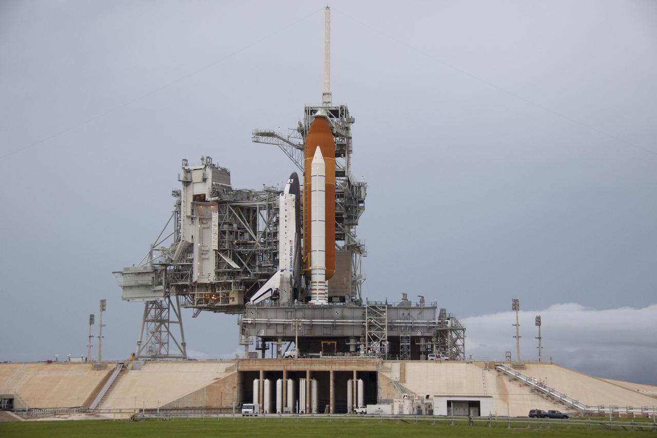 CAPE CANAVERAL, Fla. -- Space shuttle Atlantis is revealed on Launch Pad 39A at NASA's Kennedy Space Center in Florida following the move of the rotating service structure (RSS). The structure provides weather protection and access to the shuttle while it awaits liftoff on the pad. RSS "rollback" marks a major milestone in Atlantis' STS-135 mission countdown.            Atlantis and its crew of four; Commander Chris Ferguson, Pilot Doug Hurley and Mission Specialists Sandy Magnus and Rex Walheim, are scheduled to lift off at 11:26 a.m. EDT on July 8 to deliver the Raffaello multi-purpose logistics module packed with supplies and spare parts to the International Space Station. Atlantis also will fly the Robotic Refueling Mission experiment that will investigate the potential for robotically refueling existing satellites in orbit. In addition, Atlantis will return with a failed ammonia pump module to help NASA better understand the failure mechanism and improve pump designs for future systems. STS-135 will be the 33rd flight of Atlantis, the 37th shuttle mission to the space station, and the 135th and final mission of NASA's Space Shuttle Program. For more information visit, www.nasa.gov/mission_pages/shuttle/shuttlemissions/sts135/index.html. Photo credit: NASA/Troy Cryder