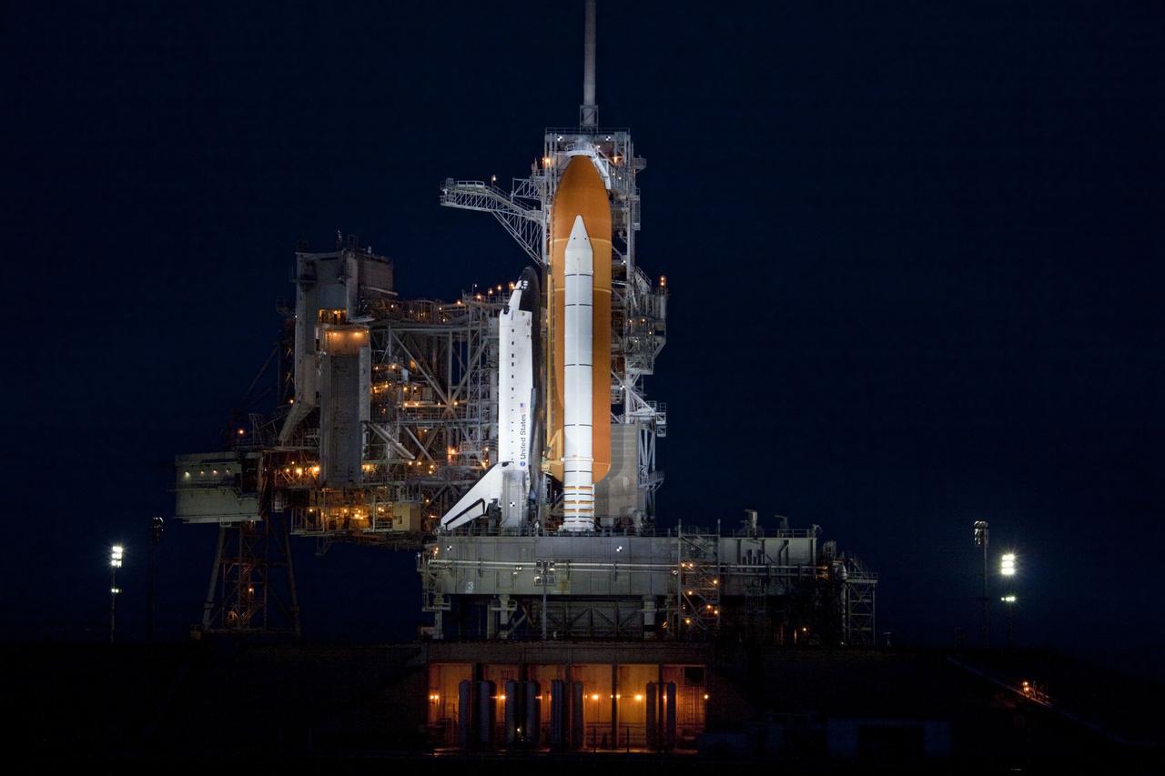 CAPE CANAVERAL, Fla. -- Space shuttle Atlantis is revealed on Launch Pad 39A at NASA's Kennedy Space Center in Florida following the move of the rotating service structure (RSS). The structure provides weather protection and access to the shuttle while it awaits liftoff on the pad. RSS retract marks a major milestone in Atlantis' STS-135 mission countdown.            Atlantis and its crew of four; Commander Chris Ferguson, Pilot Doug Hurley, Mission Specialists Sandy Magnus and Rex Walheim will lift off at 11:26 a.m. EDT on July 8 to deliver the Raffaello multi-purpose logistics module packed with supplies and spare parts for the International Space Station. Atlantis also will fly the Robotic Refueling Mission experiment that will investigate the potential for robotically refueling existing satellites in orbit. In addition, Atlantis will return with a failed ammonia pump module to help NASA better understand the failure mechanism and improve pump designs for future systems. STS-135 is the 33rd flight of Atlantis, the 37th shuttle mission to the space station, and the 135th and final mission of NASA's Space Shuttle Program. For more information, visit www.nasa.gov/mission_pages/shuttle/shuttlemissions/sts135/index.html. Photo credit: Jim Grossmann