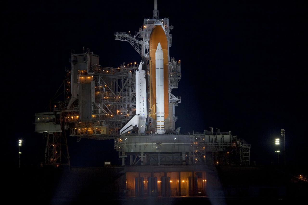 CAPE CANAVERAL, Fla. -- Space shuttle Atlantis is revealed on Launch Pad 39A at NASA's Kennedy Space Center in Florida following the move of the rotating service structure (RSS). The structure provides weather protection and access to the shuttle while it awaits liftoff on the pad. RSS retract marks a major milestone in Atlantis' STS-135 mission countdown.          Atlantis and its crew of four; Commander Chris Ferguson, Pilot Doug Hurley, Mission Specialists Sandy Magnus and Rex Walheim will lift off at 11:26 a.m. EDT on July 8 to deliver the Raffaello multi-purpose logistics module packed with supplies and spare parts for the International Space Station. Atlantis also will fly the Robotic Refueling Mission experiment that will investigate the potential for robotically refueling existing satellites in orbit. In addition, Atlantis will return with a failed ammonia pump module to help NASA better understand the failure mechanism and improve pump designs for future systems. STS-135 is the 33rd flight of Atlantis, the 37th shuttle mission to the space station, and the 135th and final mission of NASA's Space Shuttle Program. For more information, visit www.nasa.gov/mission_pages/shuttle/shuttlemissions/sts135/index.html. Photo credit: Jim Grossmann