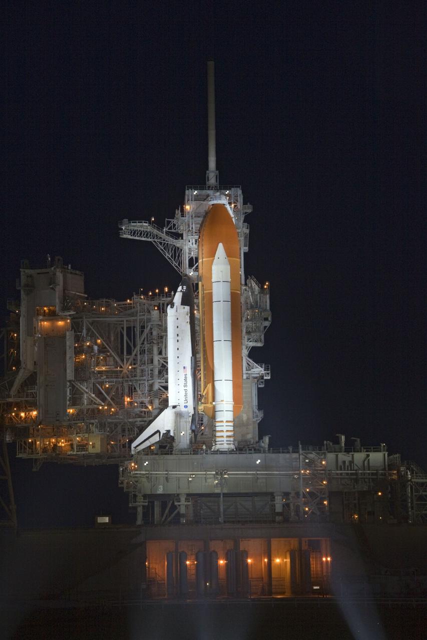 CAPE CANAVERAL, Fla. -- Space shuttle Atlantis is revealed on Launch Pad 39A at NASA's Kennedy Space Center in Florida following the move of the rotating service structure (RSS). The structure provides weather protection and access to the shuttle while it awaits liftoff on the pad. RSS retract marks a major milestone in Atlantis' STS-135 mission countdown.          Atlantis and its crew of four; Commander Chris Ferguson, Pilot Doug Hurley, Mission Specialists Sandy Magnus and Rex Walheim will lift off at 11:26 a.m. EDT on July 8 to deliver the Raffaello multi-purpose logistics module packed with supplies and spare parts for the International Space Station. Atlantis also will fly the Robotic Refueling Mission experiment that will investigate the potential for robotically refueling existing satellites in orbit. In addition, Atlantis will return with a failed ammonia pump module to help NASA better understand the failure mechanism and improve pump designs for future systems. STS-135 is the 33rd flight of Atlantis, the 37th shuttle mission to the space station, and the 135th and final mission of NASA's Space Shuttle Program. For more information, visit www.nasa.gov/mission_pages/shuttle/shuttlemissions/sts135/index.html. Photo credit: Jim Grossmann