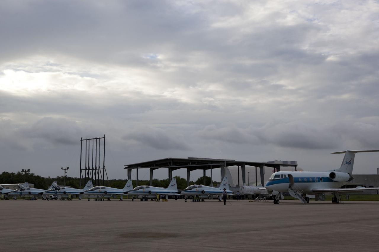 CAPE CANAVERAL, Fla. -- T-38 jets and a Shuttle Training Aircraft (STA) sit parked on the tarmac at NASA Kennedy Space Center's Shuttle Landing Facility. An STA is a Gulfstream II jet that is modified to mimic the shuttle's handling during the final phase of landing. STS-135 Commander Chris Ferguson and Pilot Doug Hurley practiced landings as part of standard procedure before space shuttle Atlantis' launch to the International Space Station. Atlantis and its crew of four -- Commander Chris Ferguson, Pilot Doug Hurley and Mission Specialists Sandy Magnus and Rex Walheim -- are scheduled to lift off at 11:26 a.m. EDT on July 8 to deliver the Raffaello multi-purpose logistics module packed with supplies and spare parts to the International Space Station. Atlantis also will fly the Robotic Refueling Mission experiment that will investigate the potential for robotically refueling existing satellites in orbit. In addition, Atlantis will return with a failed ammonia pump module to help NASA better understand the failure mechanism and improve pump designs for future systems. STS-135 will be the 33rd flight of Atlantis, the 37th shuttle mission to the space station, and the 135th and final mission of NASA's Space Shuttle Program. For more information, visit www.nasa.gov/mission_pages/shuttle/shuttlemissions/sts135/index.html. Photo credit: NASA/Frank Michaux