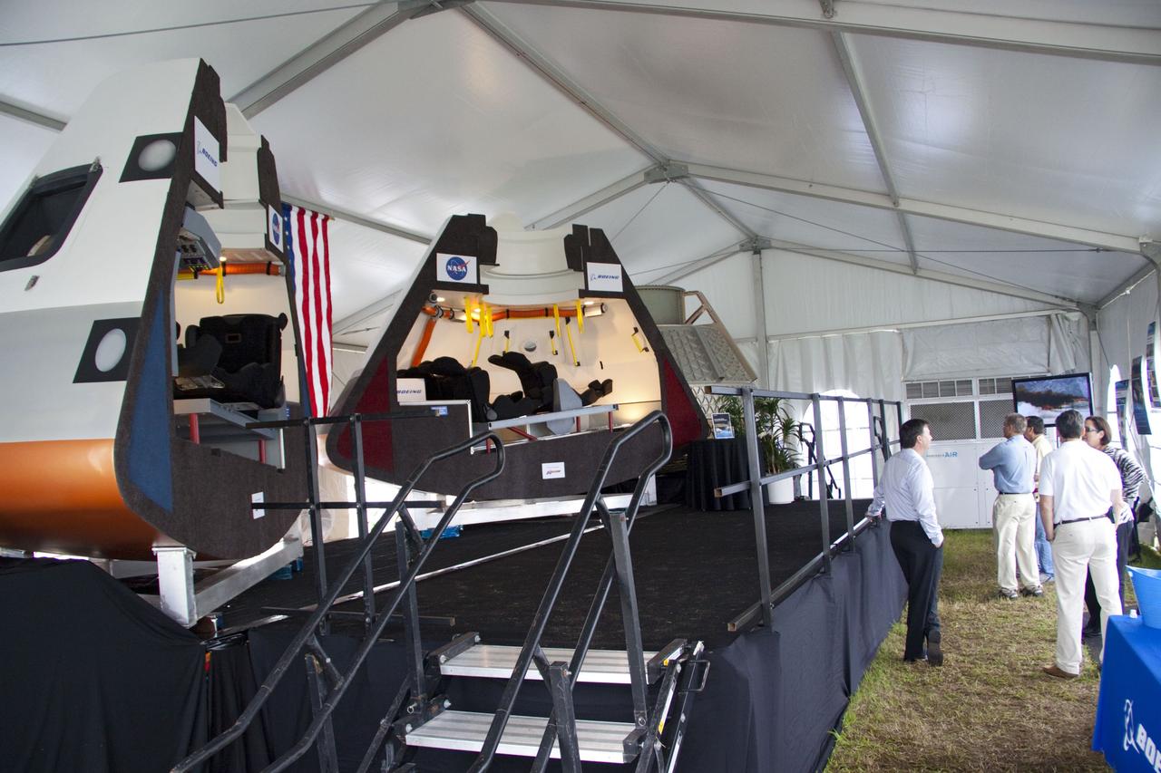 CAPE CANAVERAL, Fla. -- A media event was held for the Multi-Purpose Crew Vehicle (MPCV) that was on display in a tent on the grounds of the Press Site at NASA's Kennedy Space Center in Florida during launch activities for space shuttle Atlantis' STS-135 mission to the International Space Station. The MPCV is based on the Orion design requirements for traveling beyond low Earth orbit and will serve as the exploration vehicle that will carry the crew to space, provide emergency abort capability, sustain the crew during the space travel, and provide safe re-entry from deep space return velocities.           Atlantis began its final flight, with Commander Chris Ferguson, Pilot Doug Hurley and Mission Specialists Sandy Magnus and Rex Walheim on board, at 11:29 a.m. EDT July 8 to deliver the Raffaello multi-purpose logistics module packed with supplies and spare parts to the station. Also in Atlantis' payload bay is the Robotic Refueling Mission experiment that will investigate the potential for robotically refueling existing satellites in orbit. In addition, Atlantis will return with a failed ammonia pump module to help NASA better understand the failure mechanism and improve pump designs for future systems. STS-135 is the 33rd flight of Atlantis, the 37th shuttle mission to the space station, and the 135th and final mission of NASA's Space Shuttle Program. For more information, visit www.nasa.gov/mission_pages/shuttle/shuttlemissions/sts135/index.html. Photo credit: NASA/Jim Grossmann
