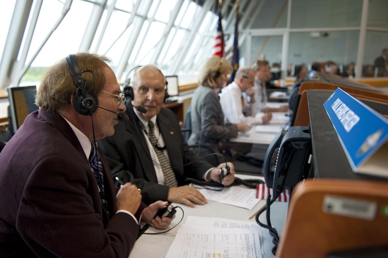 CAPE CANAVERAL, Fla. -- In Firing Room 4 of the Launch Control Center at NASA's Kennedy Space Center in Florida, NASA Launch Commentator and Public Affairs Officer George Diller interviews former Kennedy Director of Public Affairs Hugh Harris during prelaunch activities before liftoff of space shuttle Atlantis on its STS-135 mission.              Atlantis with its crew of four; Commander Chris Ferguson, Pilot Doug Hurley, Mission Specialists Sandy Magnus and Rex Walheim, lifted off at 11:29 a.m. EDT on July 8, 2011 to deliver the Raffaello multi-purpose logistics module packed with supplies and spare parts for the station. Atlantis also will fly the Robotic Refueling Mission experiment that will investigate the potential for robotically refueling existing satellites in orbit. In addition, Atlantis will return with a failed ammonia pump module to help NASA better understand the failure mechanism and improve pump designs for future systems. STS-135 will be the 33rd flight of Atlantis, the 37th shuttle mission to the space station, and the 135th and final mission of NASA's Space Shuttle Program. For more information, visit www.nasa.gov/mission_pages/shuttle/shuttlemissions/sts135/index.html. Photo credit: NASA/Kim Shiflett