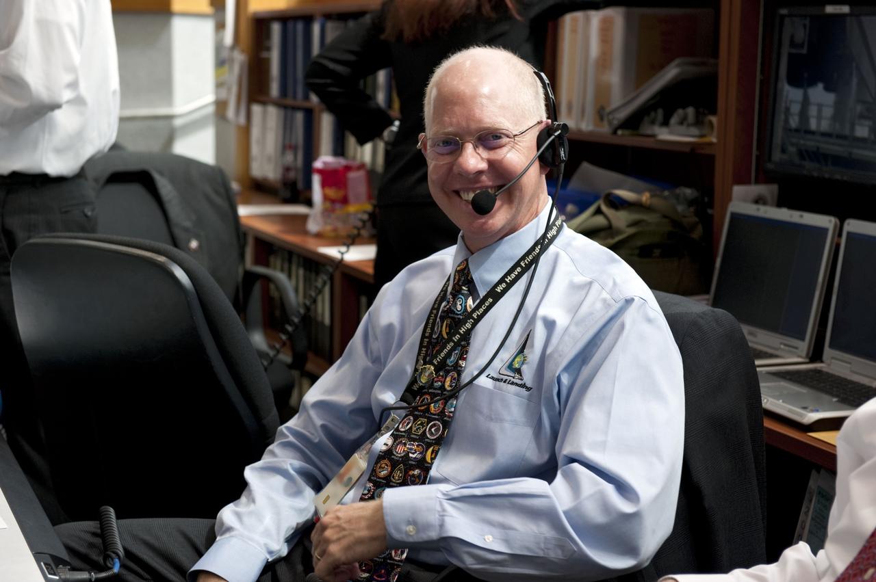 CAPE CANAVERAL, Fla. -- In Firing Room 4 of the Launch Control Center at NASA's Kennedy Space Center in Florida, launch team members monitor the countdown to the launch of space shuttle Atlantis on its STS-135 mission to the International Space Station. Seen here is NASA Test Director Steve Payne.      Atlantis with its crew of four; Commander Chris Ferguson, Pilot Doug Hurley, Mission Specialists Sandy Magnus and Rex Walheim, lifted off at 11:29 a.m. EDT on July 8, 2011 to deliver the Raffaello multi-purpose logistics module packed with supplies and spare parts for the station. Atlantis also will fly the Robotic Refueling Mission experiment that will investigate the potential for robotically refueling existing satellites in orbit. In addition, Atlantis will return with a failed ammonia pump module to help NASA better understand the failure mechanism and improve pump designs for future systems. STS-135 will be the 33rd flight of Atlantis, the 37th shuttle mission to the space station, and the 135th and final mission of NASA's Space Shuttle Program. For more information, visit www.nasa.gov/mission_pages/shuttle/shuttlemissions/sts135/index.html. Photo credit: NASA/Kim Shiflett