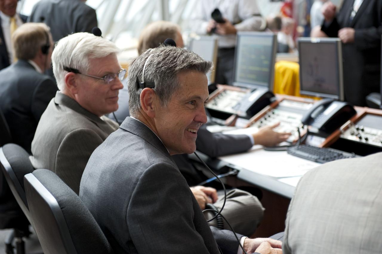 CAPE CANAVERAL, Fla. -- In Firing Room 4 of the Launch Control Center at NASA's Kennedy Space Center in Florida, Kennedy Center Director Bob Cabana and Johnson Center Director Mike Coats monitor the countdown to the launch of space shuttle Atlantis on its STS-135 mission to the International Space Station. Atlantis with its crew of four; Commander Chris Ferguson, Pilot Doug Hurley, Mission Specialists Sandy Magnus and Rex Walheim, lifted off at 11:29 a.m. EDT on July 8, 2011 to deliver the Raffaello multi-purpose logistics module packed with supplies and spare parts for the station. Atlantis also will fly the Robotic Refueling Mission experiment that will investigate the potential for robotically refueling existing satellites in orbit. In addition, Atlantis will return with a failed ammonia pump module to help NASA better understand the failure mechanism and improve pump designs for future systems. STS-135 will be the 33rd flight of Atlantis, the 37th shuttle mission to the space station, and the 135th and final mission of NASA's Space Shuttle Program. For more information, visit www.nasa.gov/mission_pages/shuttle/shuttlemissions/sts135/index.html. Photo credit: NASA/Kim Shiflett