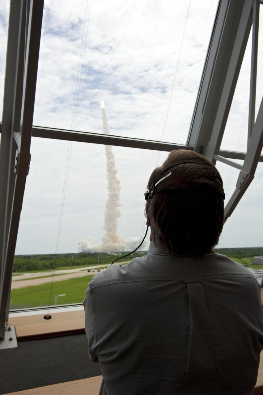 CAPE CANAVERAL, Fla. -- In Firing Room 4 of the Launch Control Center at NASA's Kennedy Space Center in Florida, Shuttle Launch Director Mike Leinbach watches intently as space shuttle Atlantis lifts off on its STS-135 mission to the International Space Station. Atlantis with its crew of four; Commander Chris Ferguson, Pilot Doug Hurley, Mission Specialists Sandy Magnus and Rex Walheim, lifted off at 11:29 a.m. EDT on July 8, 2011 to deliver the Raffaello multi-purpose logistics module packed with supplies and spare parts for the station. Atlantis also will fly the Robotic Refueling Mission experiment that will investigate the potential for robotically refueling existing satellites in orbit. In addition, Atlantis will return with a failed ammonia pump module to help NASA better understand the failure mechanism and improve pump designs for future systems. STS-135 will be the 33rd flight of Atlantis, the 37th shuttle mission to the space station, and the 135th and final mission of NASA's Space Shuttle Program. For more information, visit www.nasa.gov/mission_pages/shuttle/shuttlemissions/sts135/index.html. Photo credit: NASA/Kim Shiflett