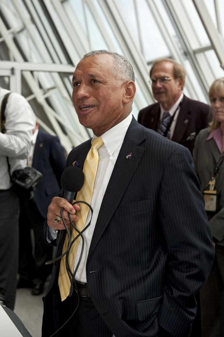 CAPE CANAVERAL, Fla. -- In Firing Room 4 of the Launch Control Center at NASA's Kennedy Space Center in Florida, NASA Administrator Charles Bolden congratulates the launch control team members following the successful launch of space shuttle Atlantis on its STS-135 mission to the International Space Station. Atlantis with its crew of four; Commander Chris Ferguson, Pilot Doug Hurley, Mission Specialists Sandy Magnus and Rex Walheim, lifted off at 11:29 a.m. EDT on July 8, 2011 to deliver the Raffaello multi-purpose logistics module packed with supplies and spare parts for the station. Atlantis also will fly the Robotic Refueling Mission experiment that will investigate the potential for robotically refueling existing satellites in orbit. In addition, Atlantis will return with a failed ammonia pump module to help NASA better understand the failure mechanism and improve pump designs for future systems. STS-135 will be the 33rd flight of Atlantis, the 37th shuttle mission to the space station, and the 135th and final mission of NASA's Space Shuttle Program. For more information, visit www.nasa.gov/mission_pages/shuttle/shuttlemissions/sts135/index.html. Photo credit: NASA/Kim Shiflett