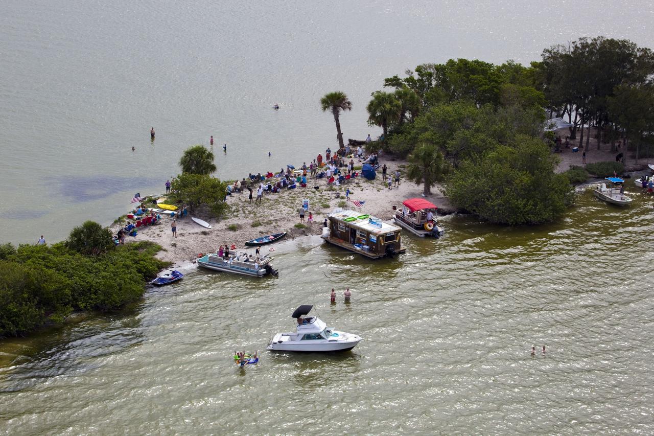 CAPE CANAVERAL, Fla. -- After 30 years and 135 missions, residents and visitors to Florida's Space Coast flock to viewing sites near Port Canaveral to see the rocket's red glare of NASA's Space Shuttle Program soar for the last time. Space shuttle Atlantis is scheduled to liftoff at 11:26 a.m. EDT from Launch Pad 39A at NASA's Kennedy Space Center in Florida. On board will be four experienced astronauts -- STS-135 Commander Chris Ferguson, Pilot Doug Hurley, and Mission Specialists Sandy Magnus and Rex Walheim.          STS-135 will deliver the Raffaello multi-purpose logistics module packed with supplies and spare parts for the International Space Station. Atlantis also will fly the Robotic Refueling Mission experiment that will investigate the potential for robotically refueling existing satellites in orbit. In addition, Atlantis will return with a failed ammonia pump module to help NASA better understand the failure mechanism and improve pump designs for future systems. STS-135 will be the 33rd flight of Atlantis, the 37th shuttle mission to the space station, and the 135th and final mission of NASA's Space Shuttle Program. For more information visit, www.nasa.gov/mission_pages/shuttle/shuttlemissions/sts135/index.html. Photo credit: NASA/Frank Michaux